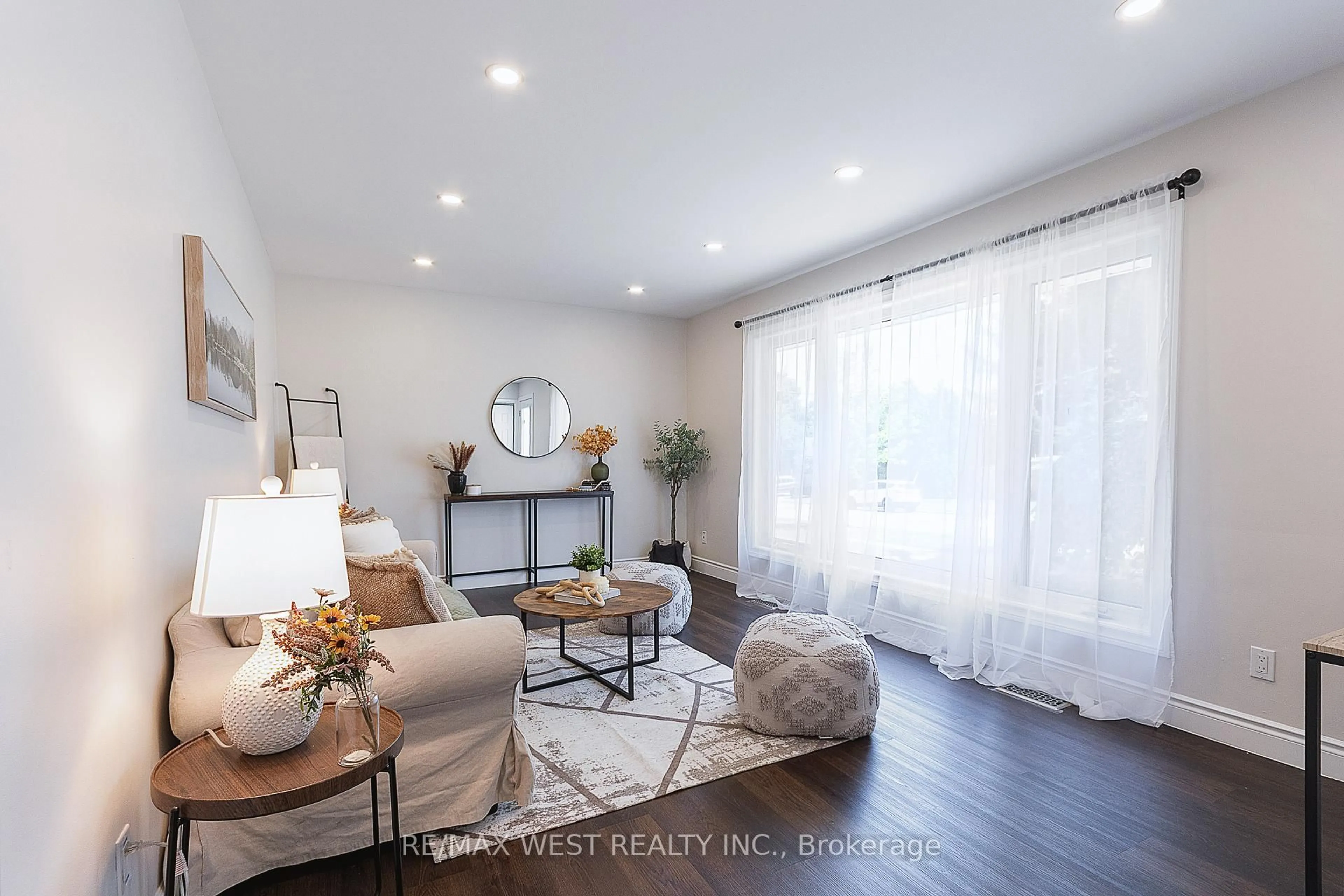 Living room with furniture, wood/laminate floor for 396 Marion Ave, Oshawa Ontario L1J 3B1
