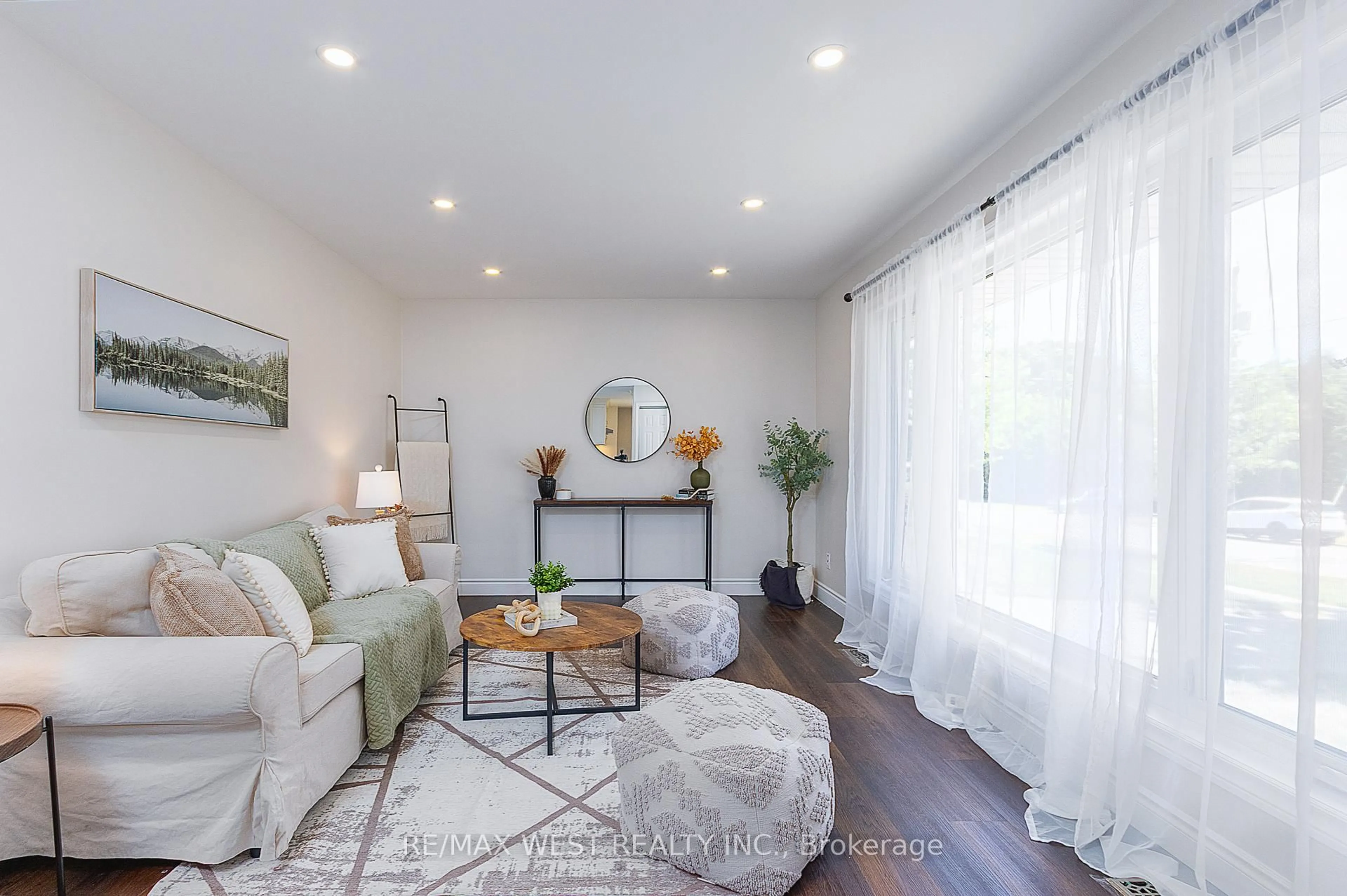 Living room with furniture, wood/laminate floor for 396 Marion Ave, Oshawa Ontario L1J 3B1