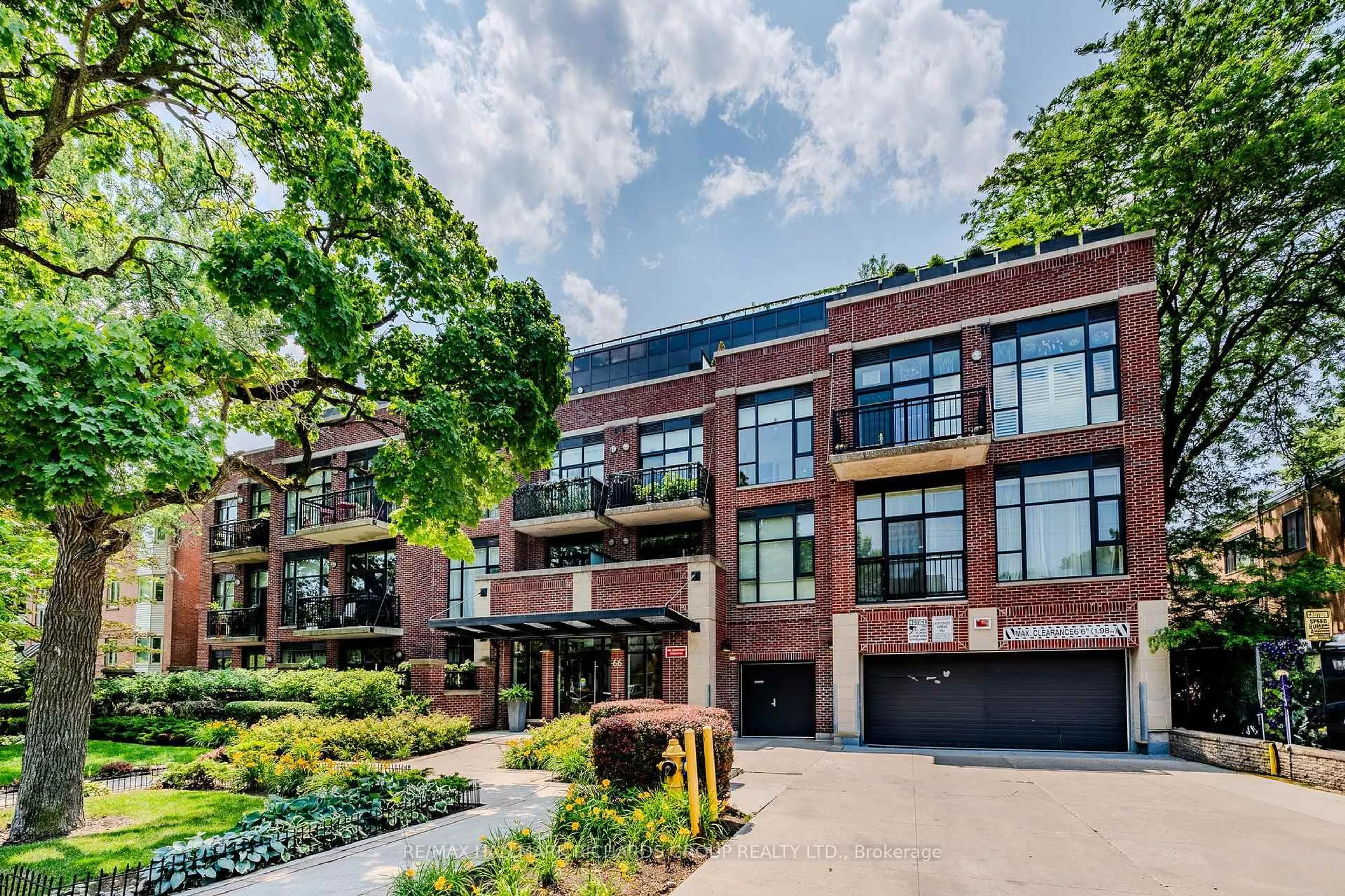 Home with brick exterior material, street for 66 Kippendavie Ave #215, Toronto Ontario M4L 0A4