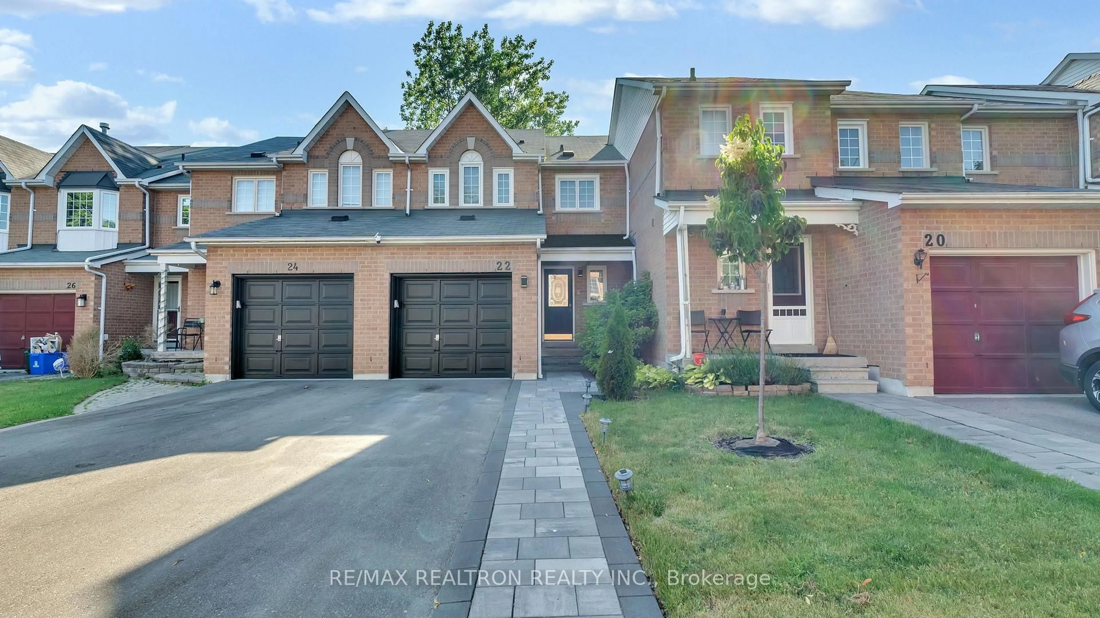Home with brick exterior material, street for 22 Macintyre Lane, Ajax Ontario L1T 3X3