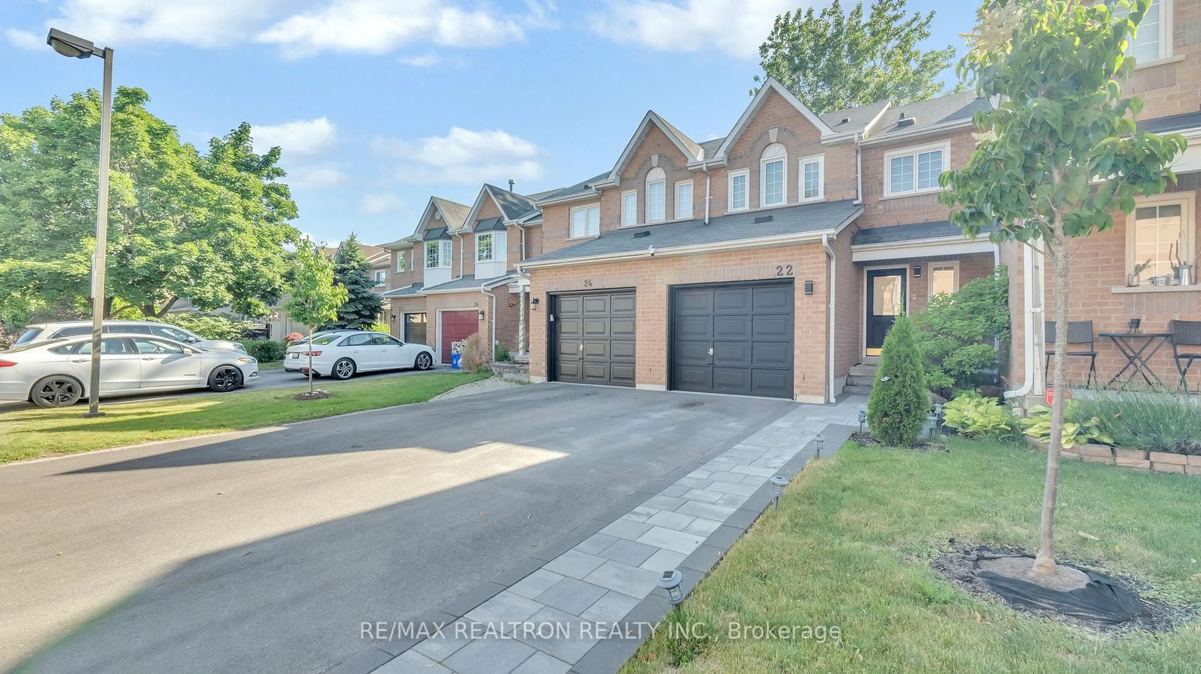 Home with brick exterior material, street for 22 Macintyre Lane, Ajax Ontario L1T 3X3