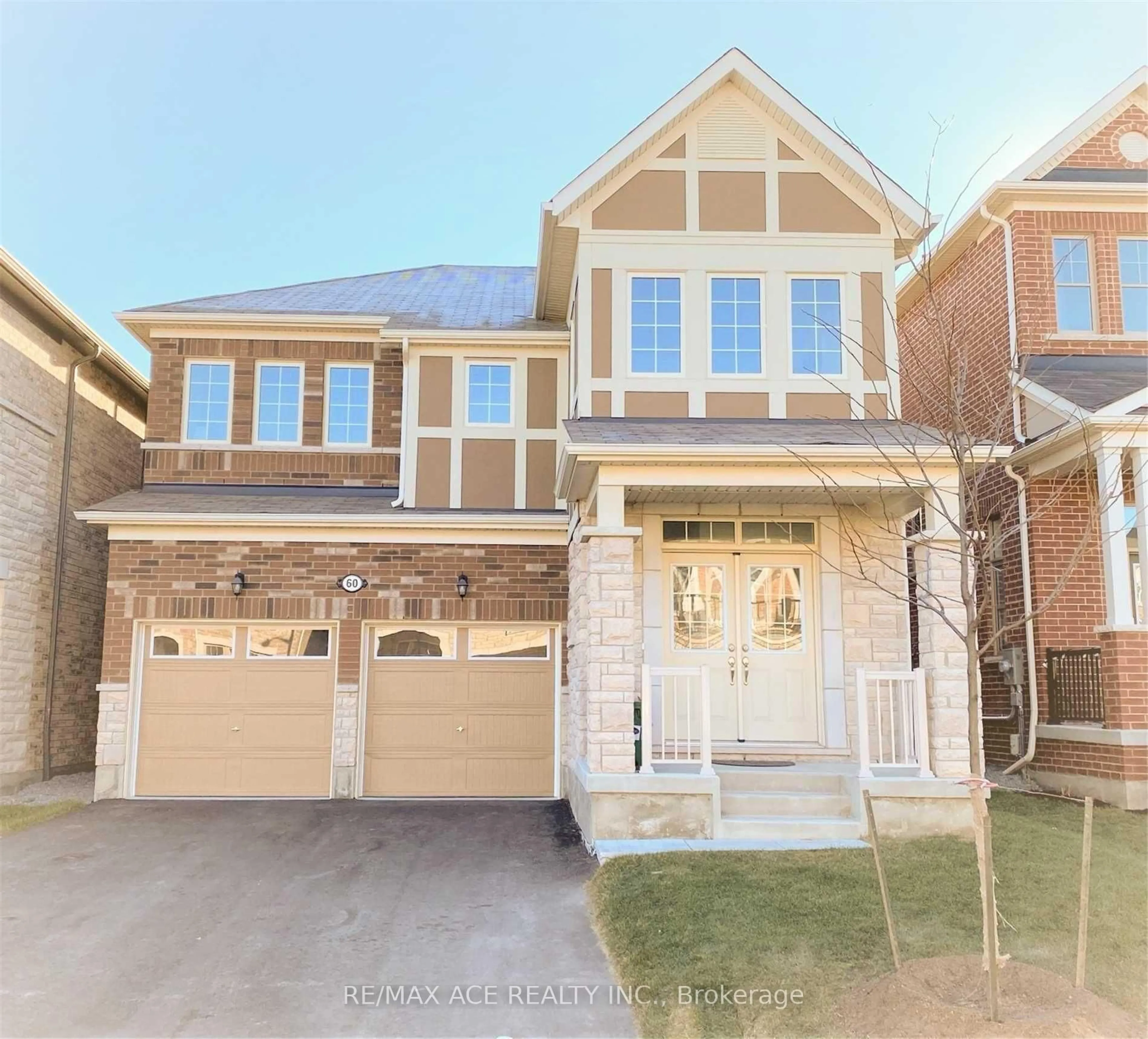 Home with brick exterior material, street for 60 Westfield Dr, Whitby Ontario L1P 0E9