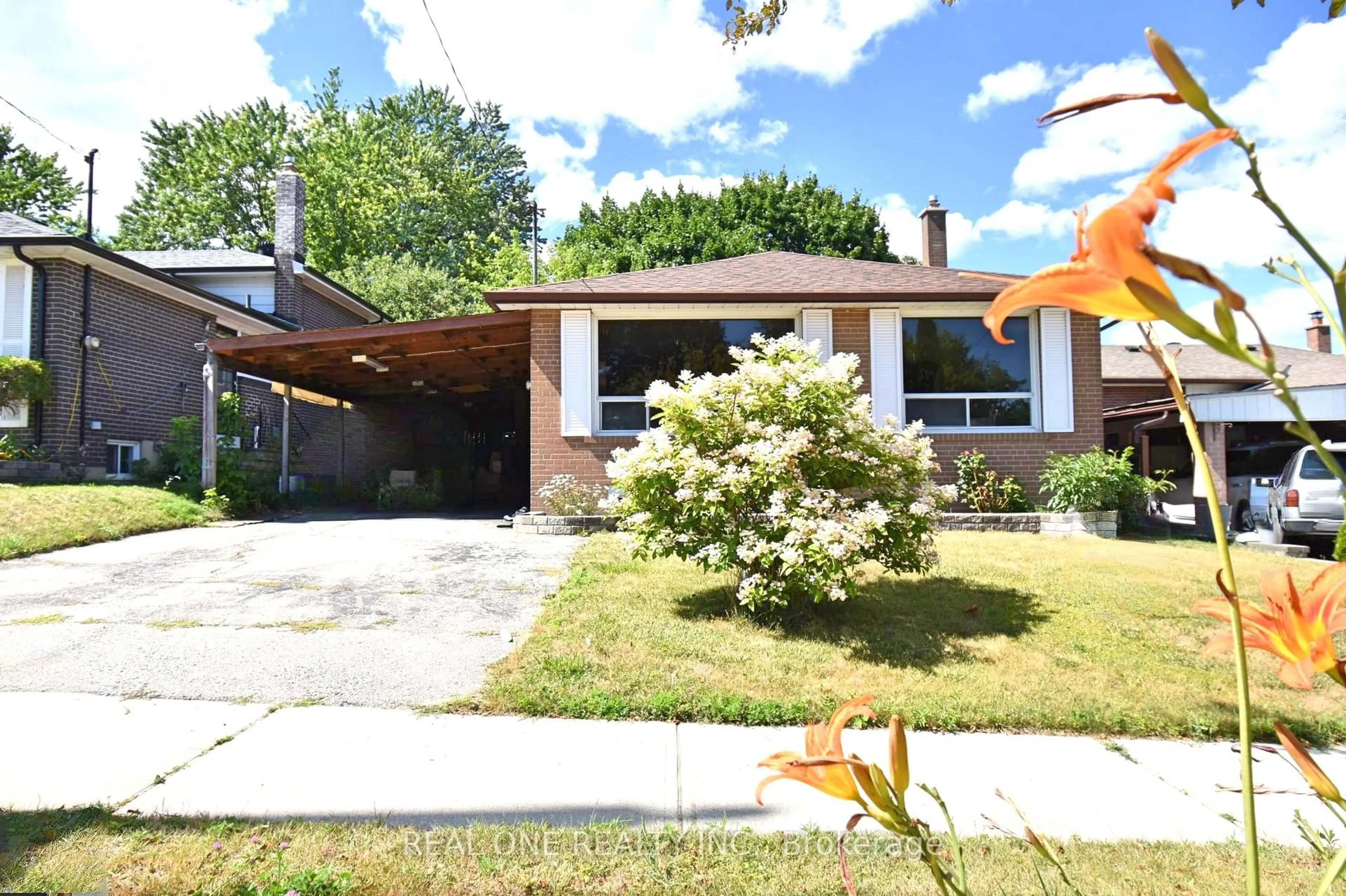 Home with brick exterior material, street for 52 Greendowns Dr, Toronto Ontario M1M 2G7