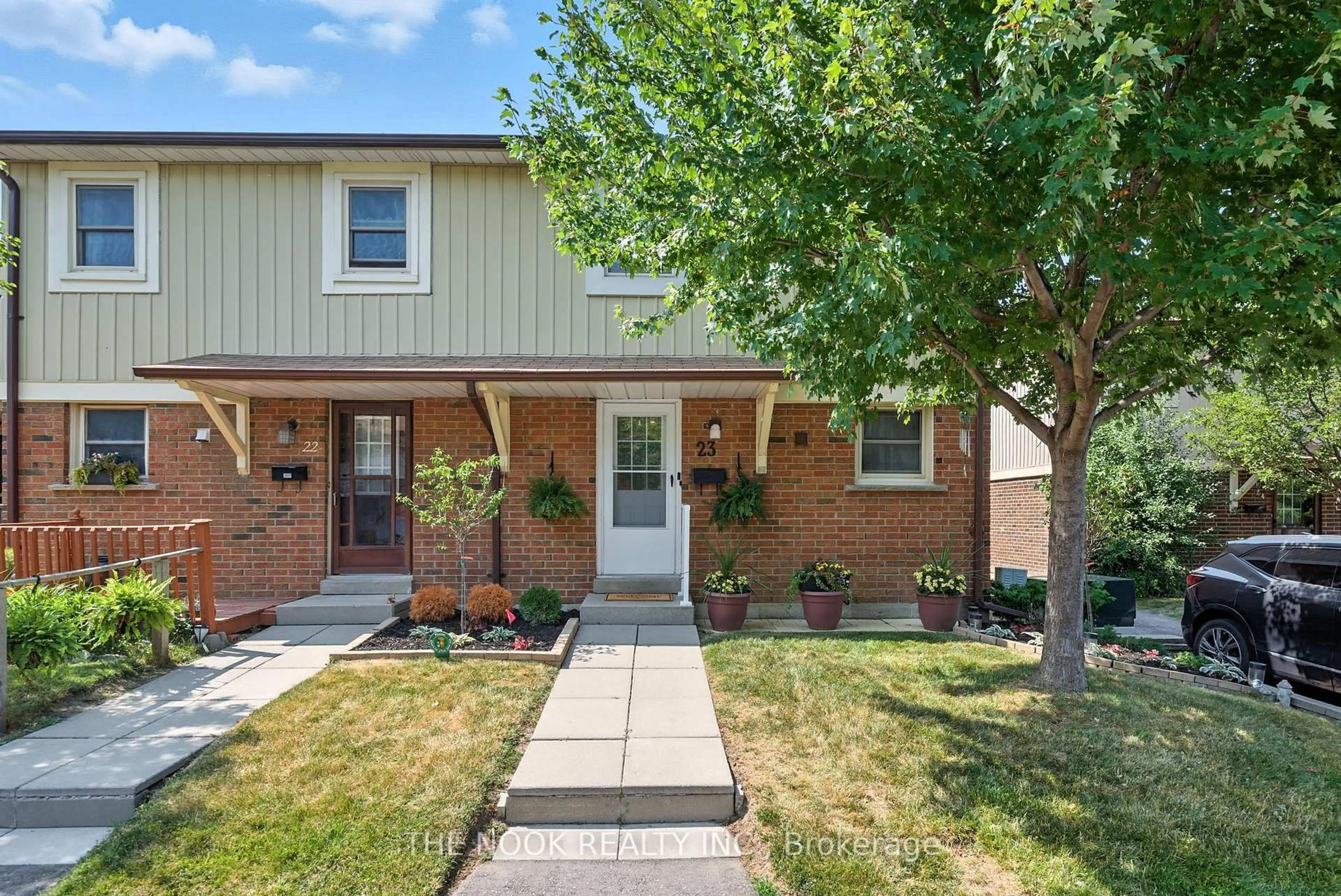 Home with brick exterior material, street for 450 Bristol Cres #23, Oshawa Ontario L1J 6M3