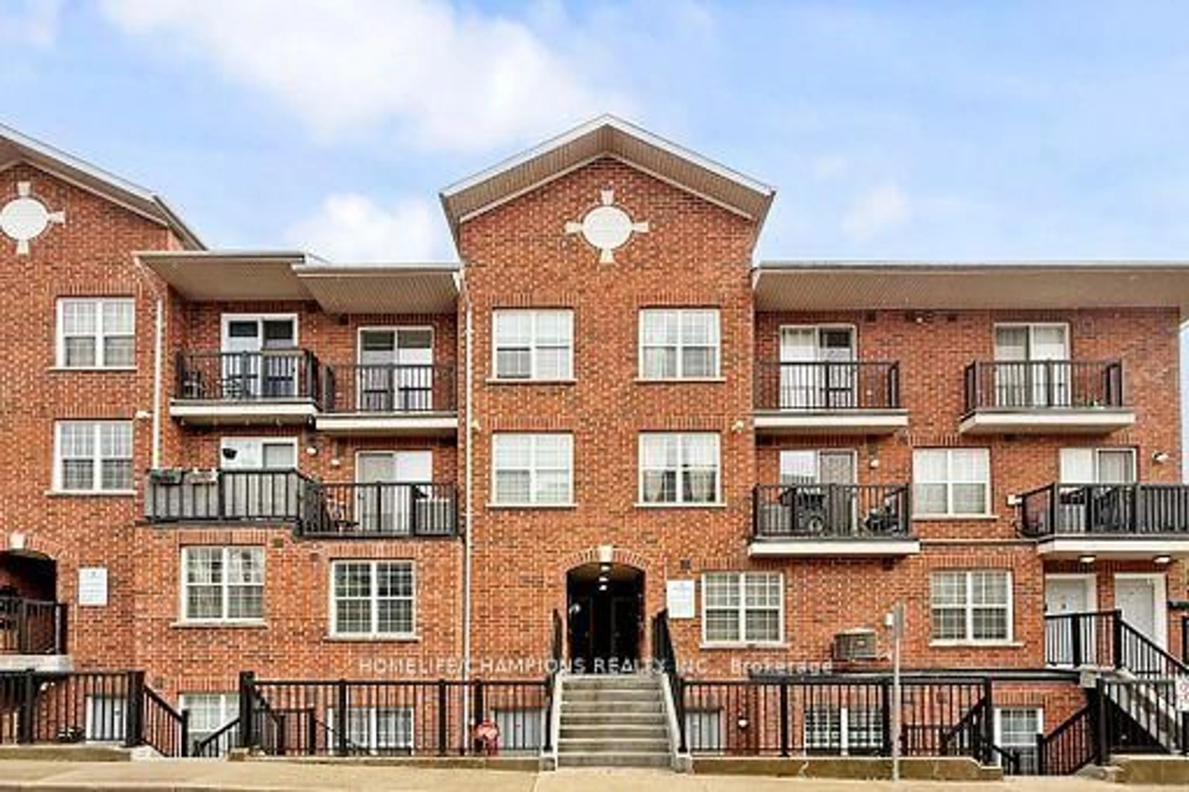 Home with brick exterior material, building for 35 Strangford Lane #304, Toronto Ontario M1L 0E5