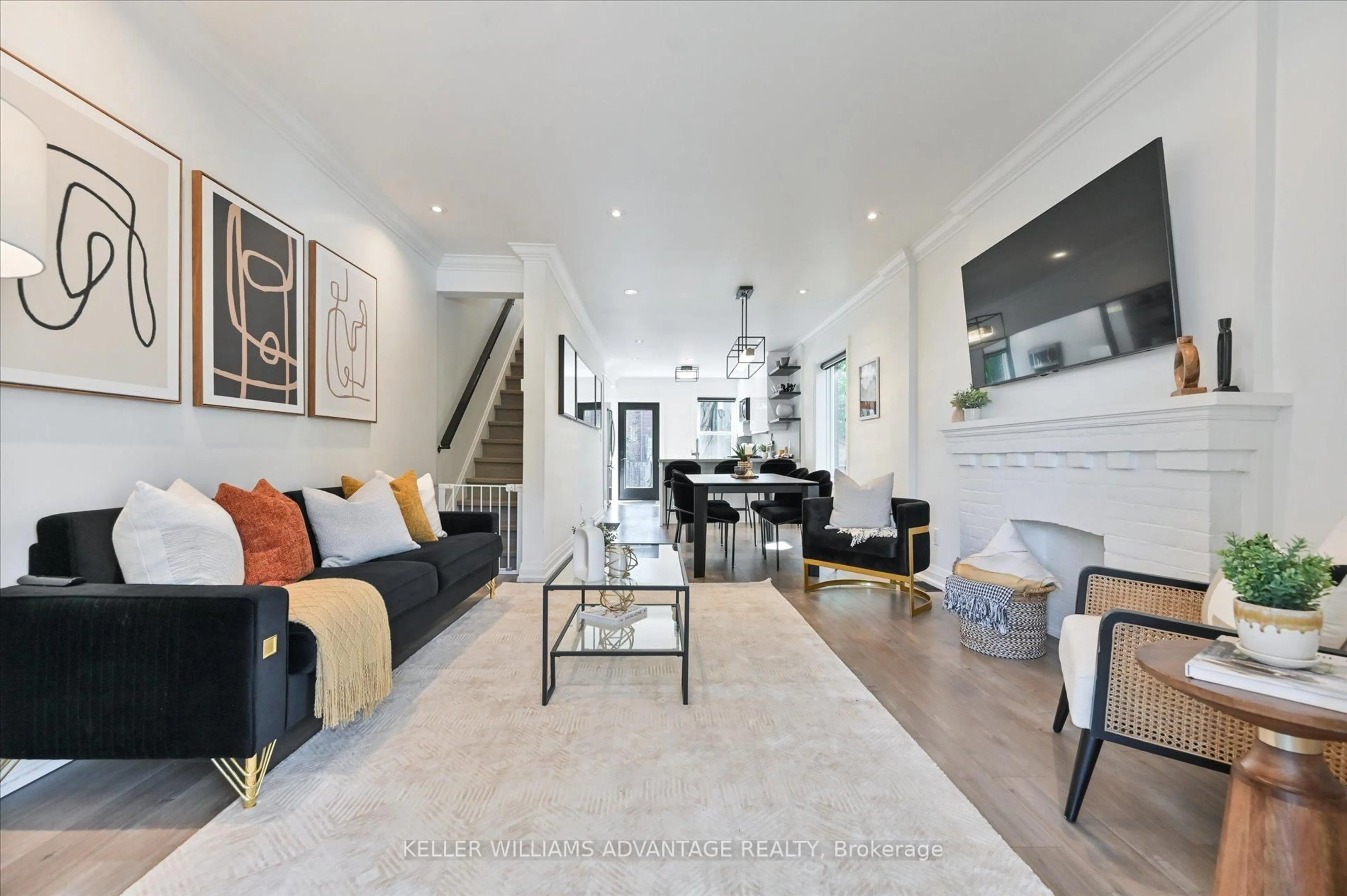 Living room with furniture, unknown for 5 Kent Rd, Toronto Ontario M4L 2X5
