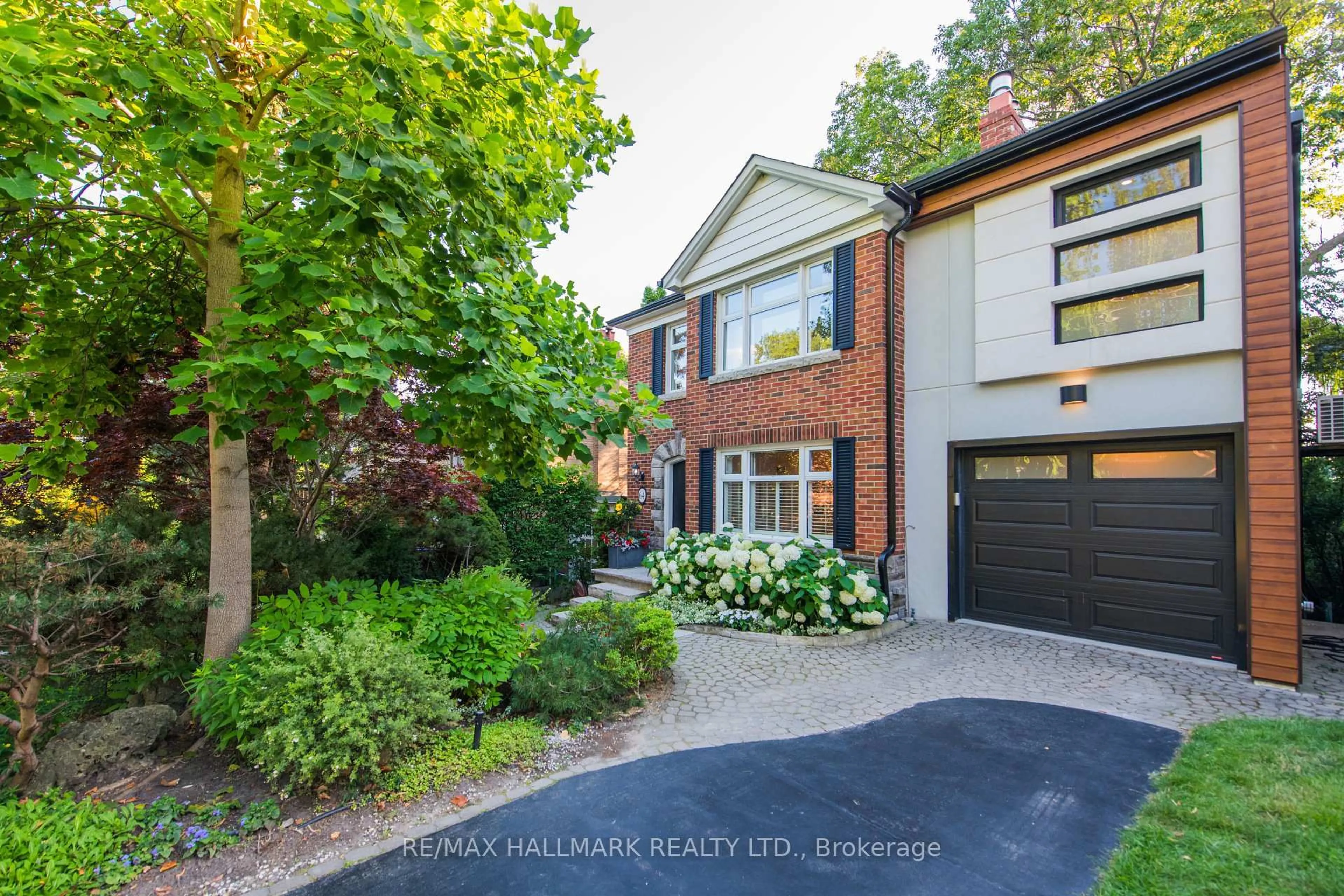Home with brick exterior material, street for 64 Southwood Dr, Toronto Ontario M4E 2T9