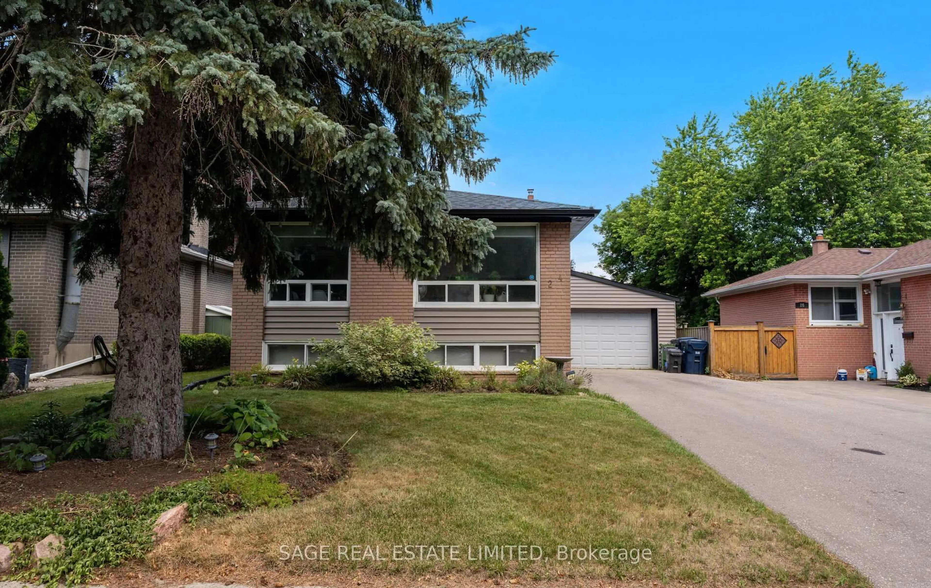 Home with brick exterior material, street for 24 Woodgrove Dr, Toronto Ontario M1E 3J8
