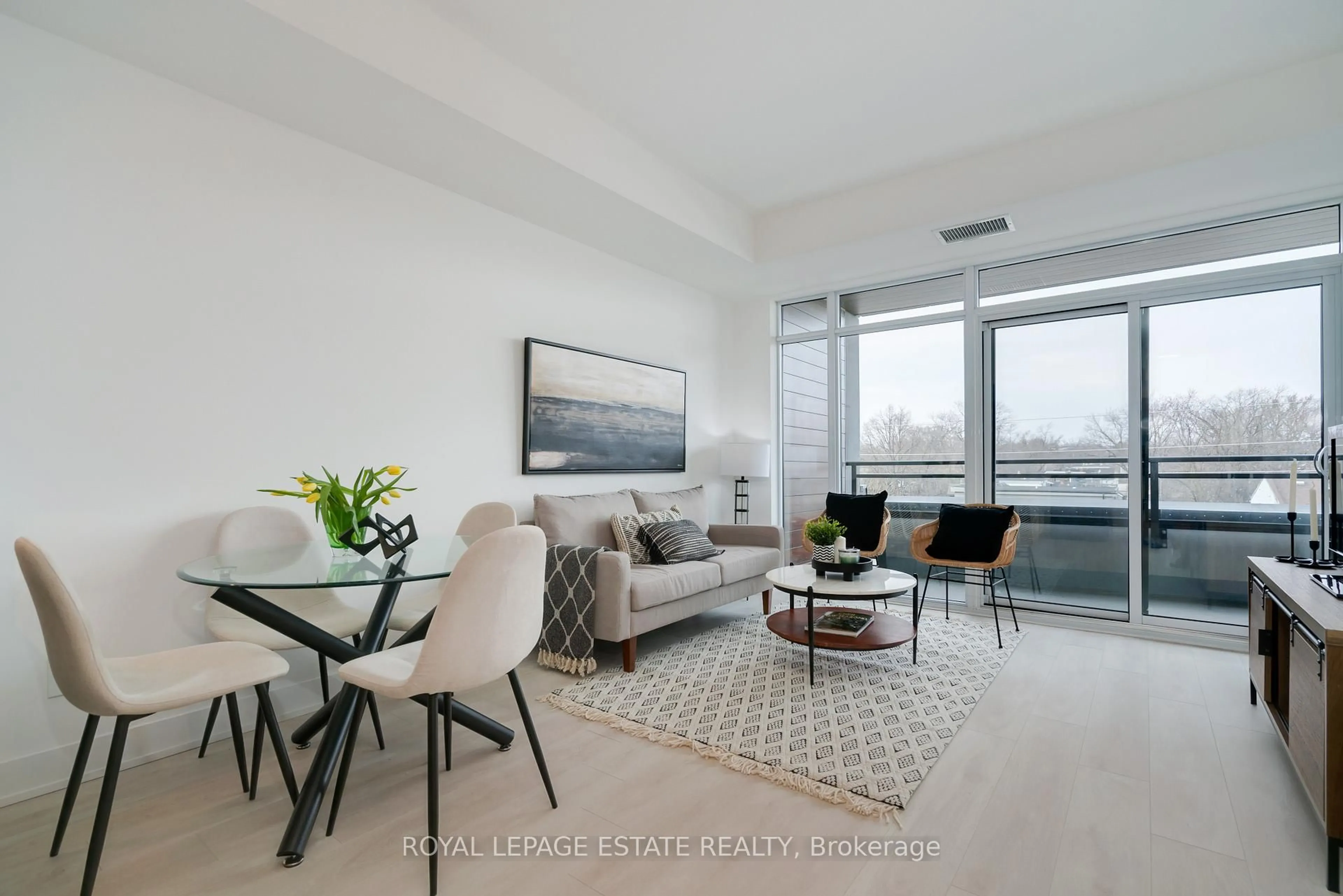 Living room with furniture, unknown for 1285 Queen St #404, Toronto Ontario M4L 0B6