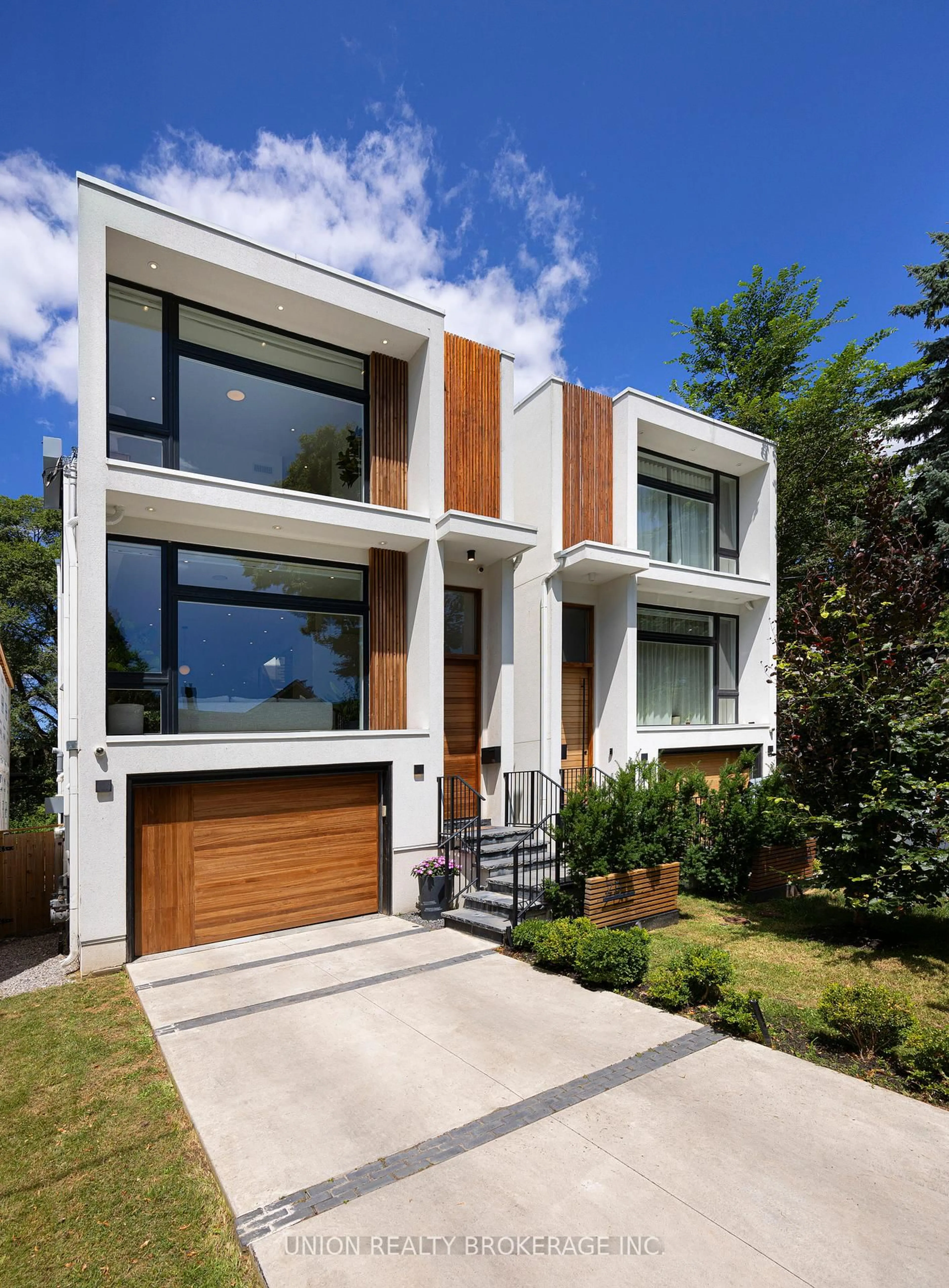 Home with brick exterior material, street for 7B Maughan Cres, Toronto Ontario M4L 3E4