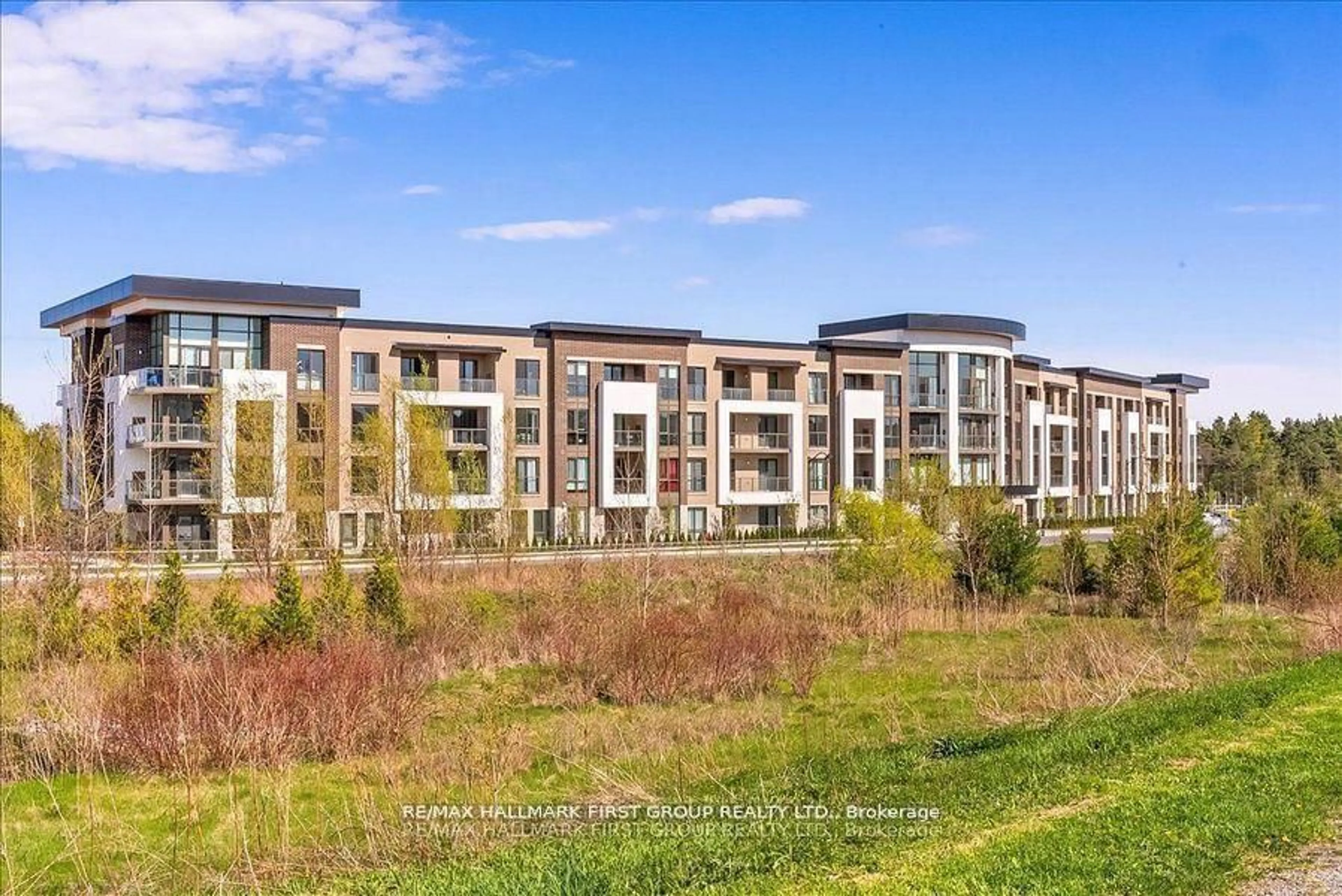 A pic from outside/outdoor area/front of a property/back of a property/a pic from drone, water/lake/river/ocean view for 385 Arctic Red Dr #409, Oshawa Ontario L1L 0W9