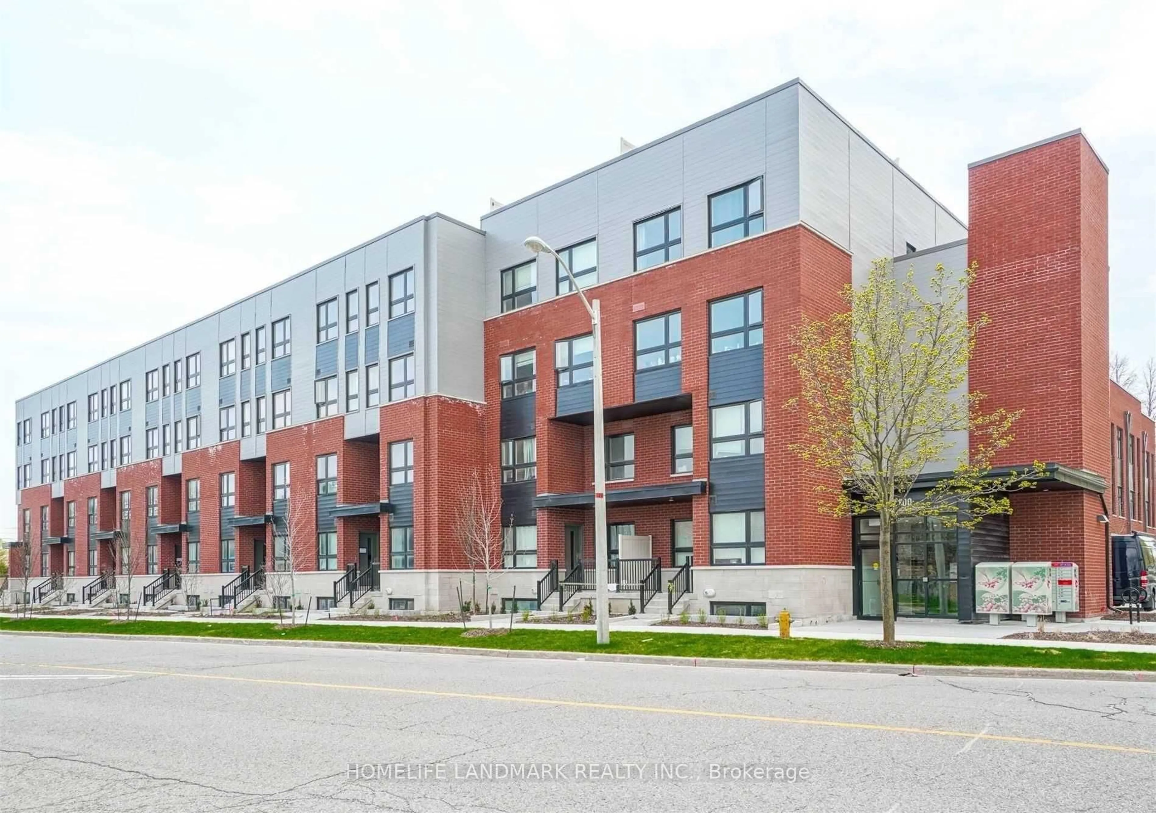 Home with brick exterior material, street for 2100 Bridletowne Circ #303, Toronto Ontario M1W 2L1