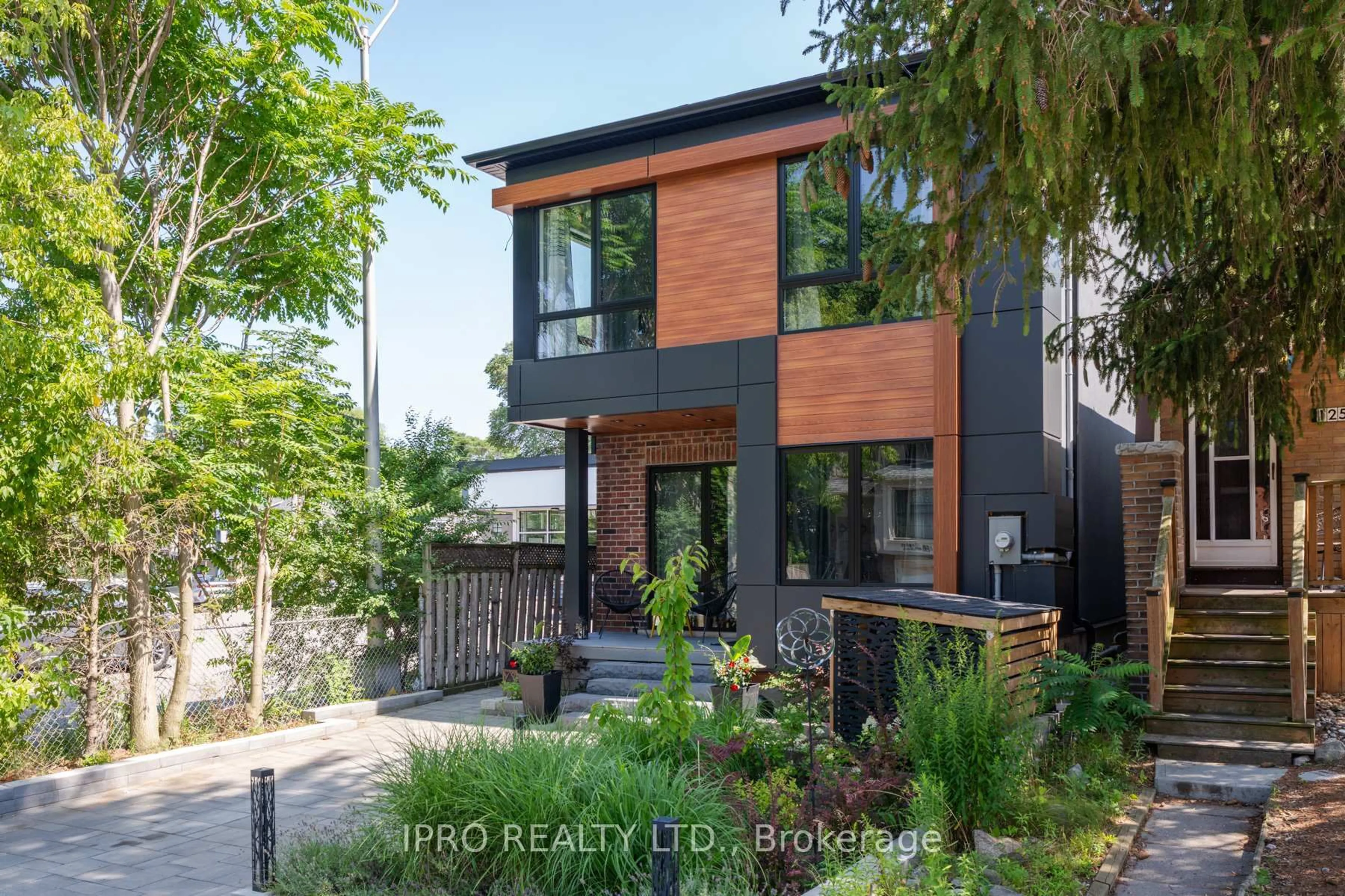 Home with brick exterior material, street for 127 Barker Ave, Toronto Ontario M4C 2N8