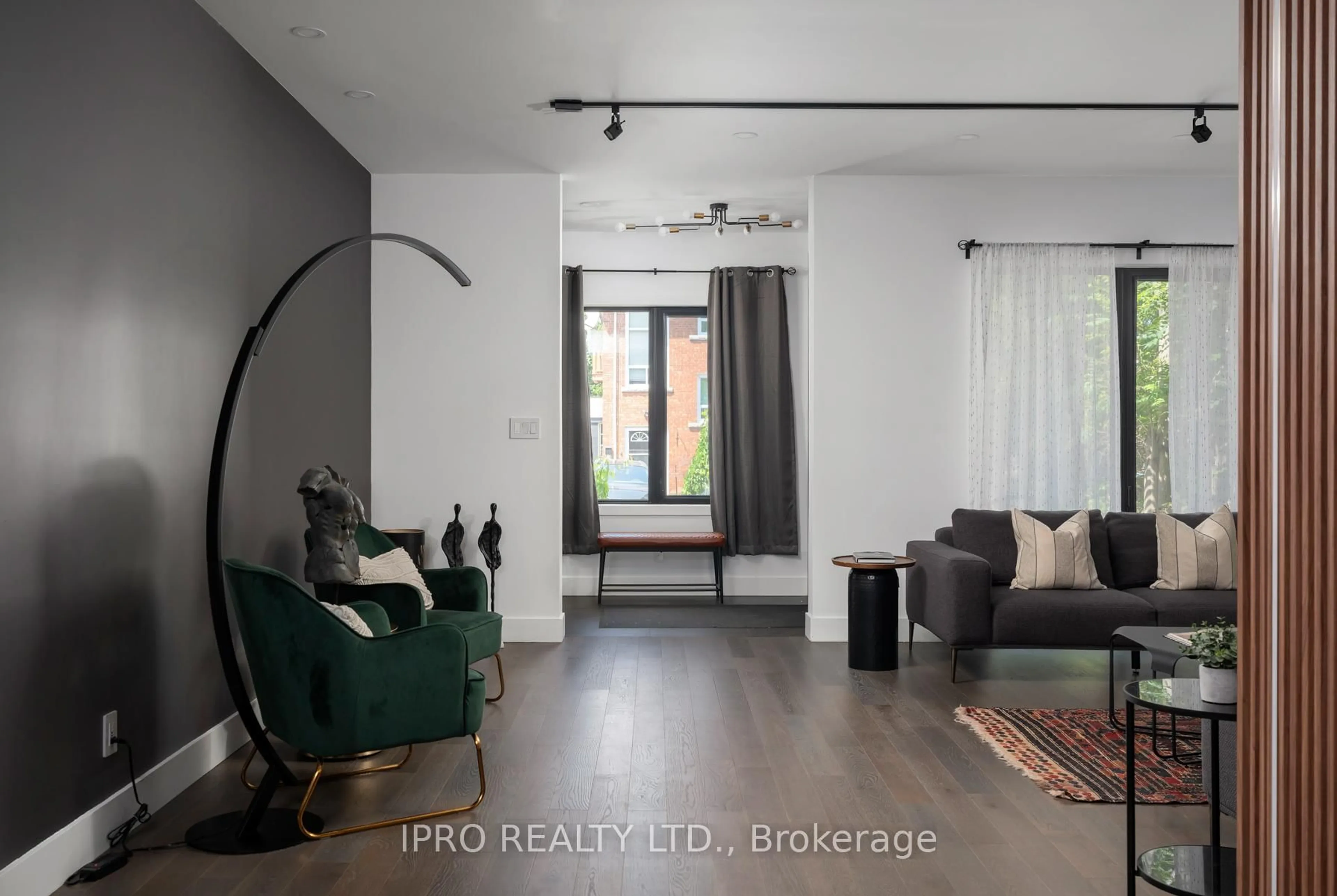 Living room with furniture, unknown for 127 Barker Ave, Toronto Ontario M4C 2N8