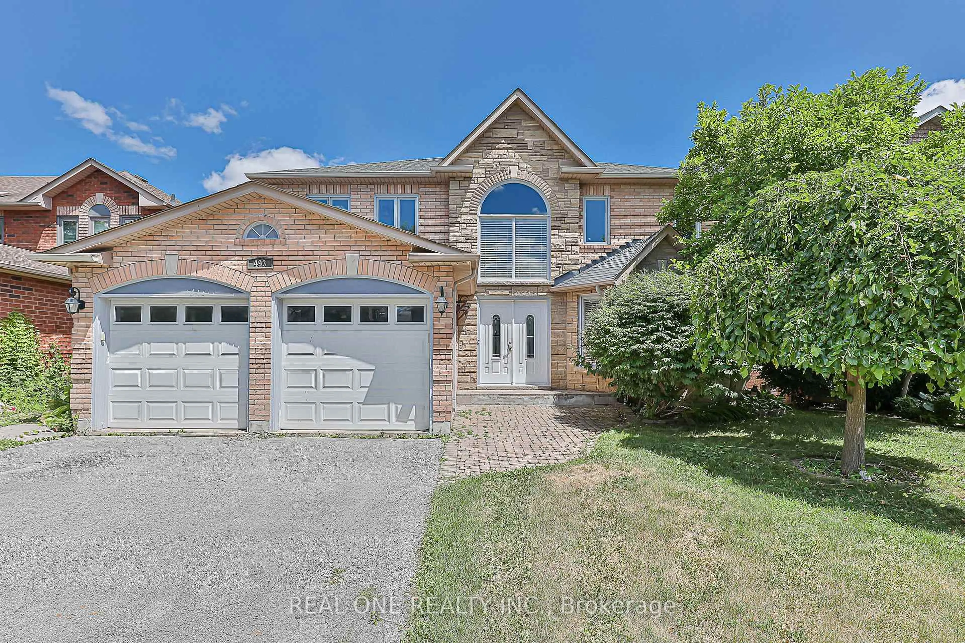 Home with brick exterior material, street for 493 Sandalwood Crt, Oshawa Ontario L1G 7X9