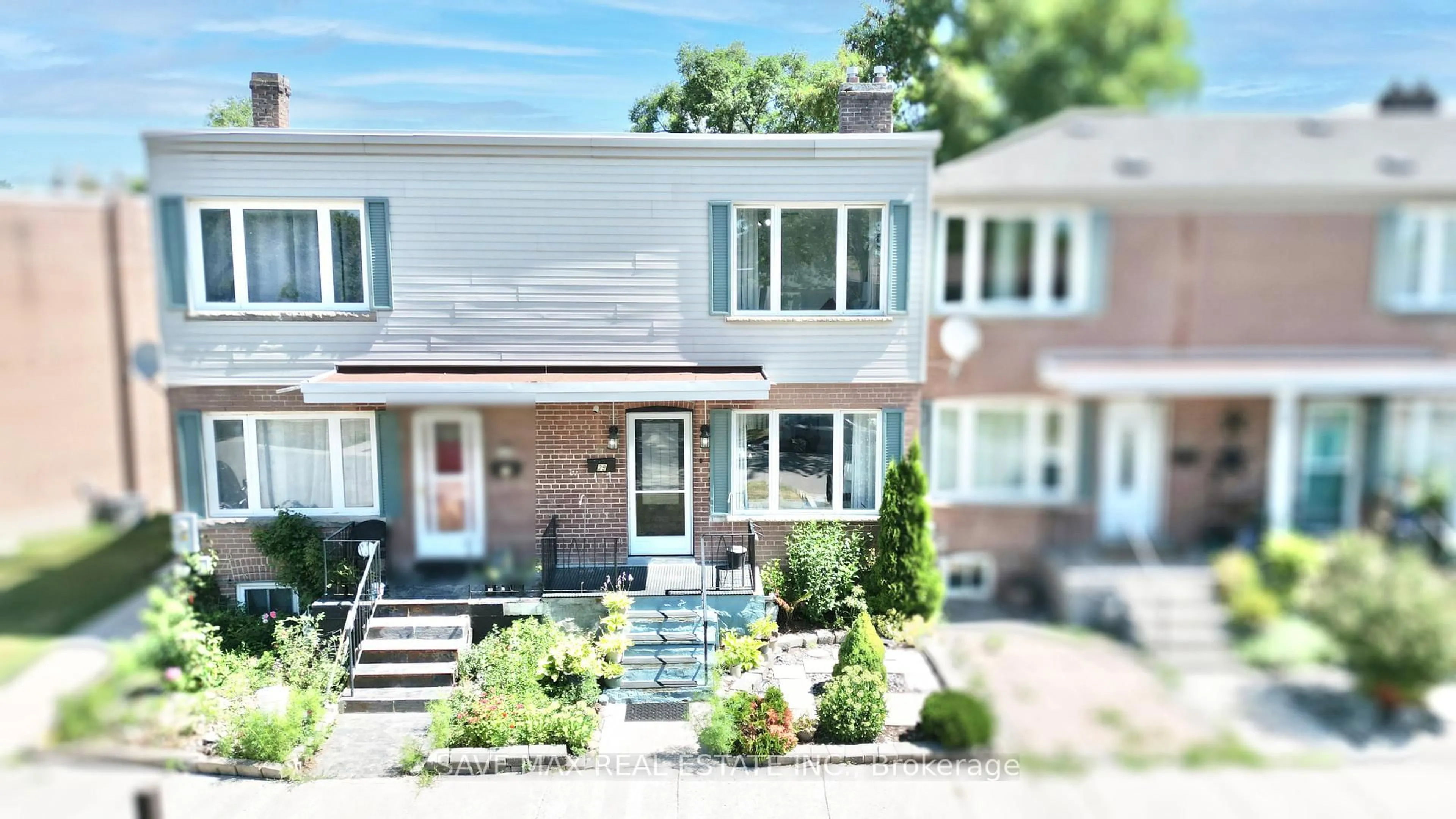 Home with brick exterior material, street for 740 Kennedy Rd #29, Toronto Ontario M1K 2C5