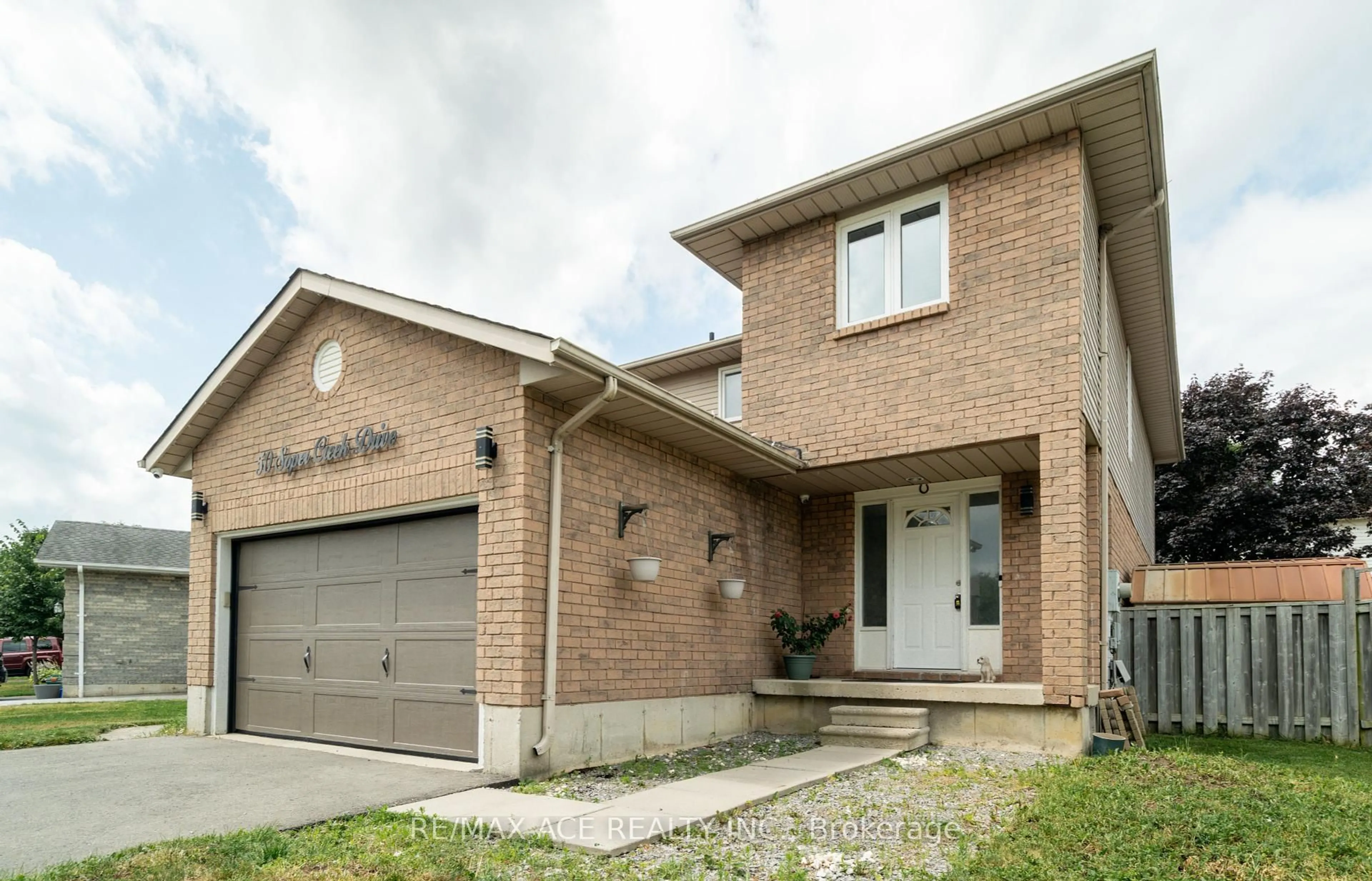Home with brick exterior material, street for 50 Soper Creek Dr, Clarington Ontario L1C 4K7