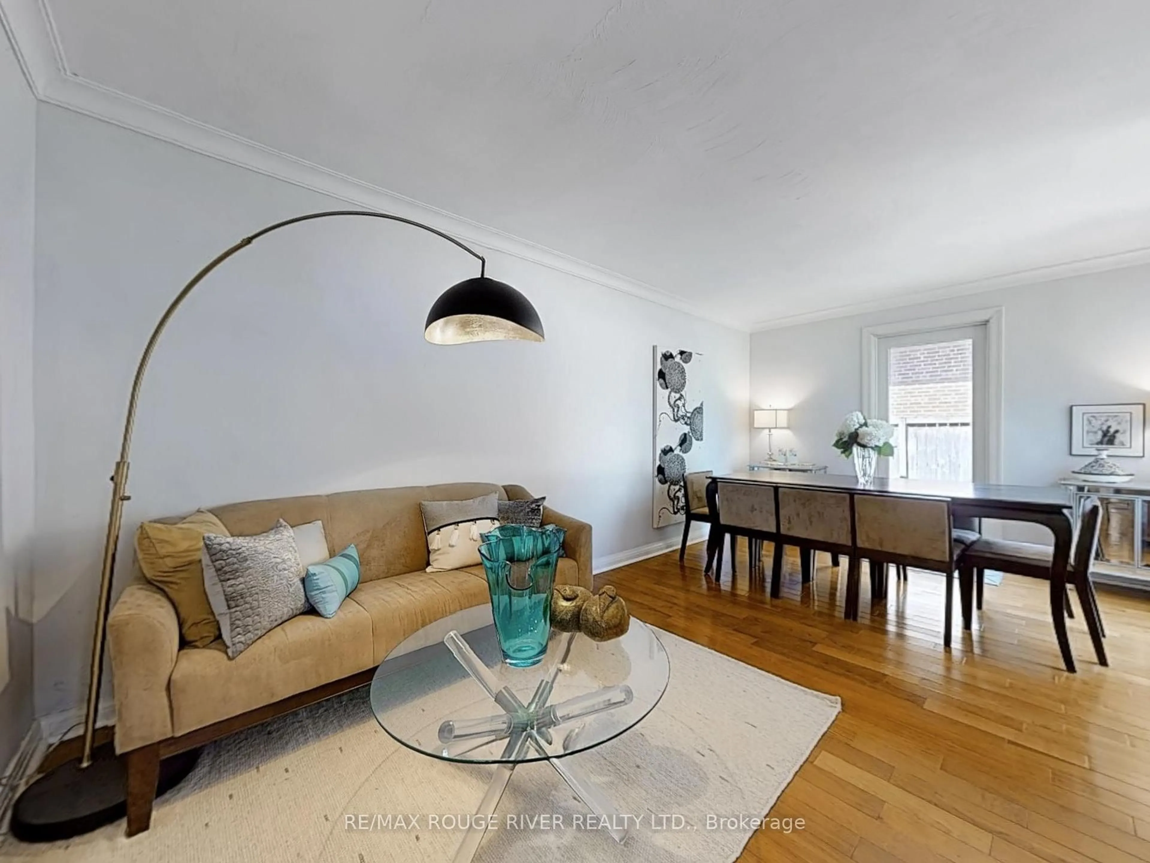 Living room with furniture, wood/laminate floor for 15 White Ave, Toronto Ontario M1C 1P1