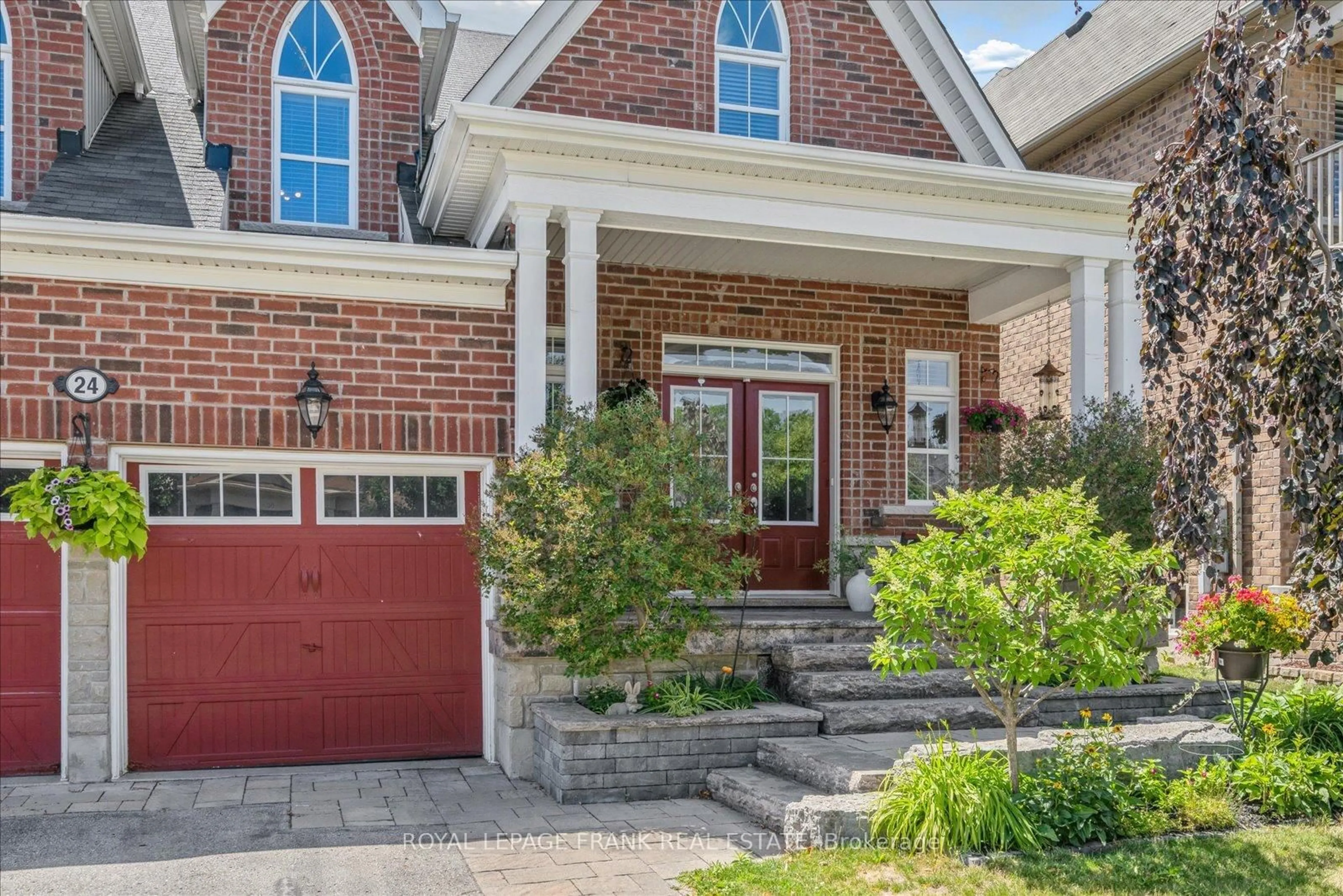Home with brick exterior material, street for 24 Burning Springs Pl, Whitby Ontario L1M 0K1