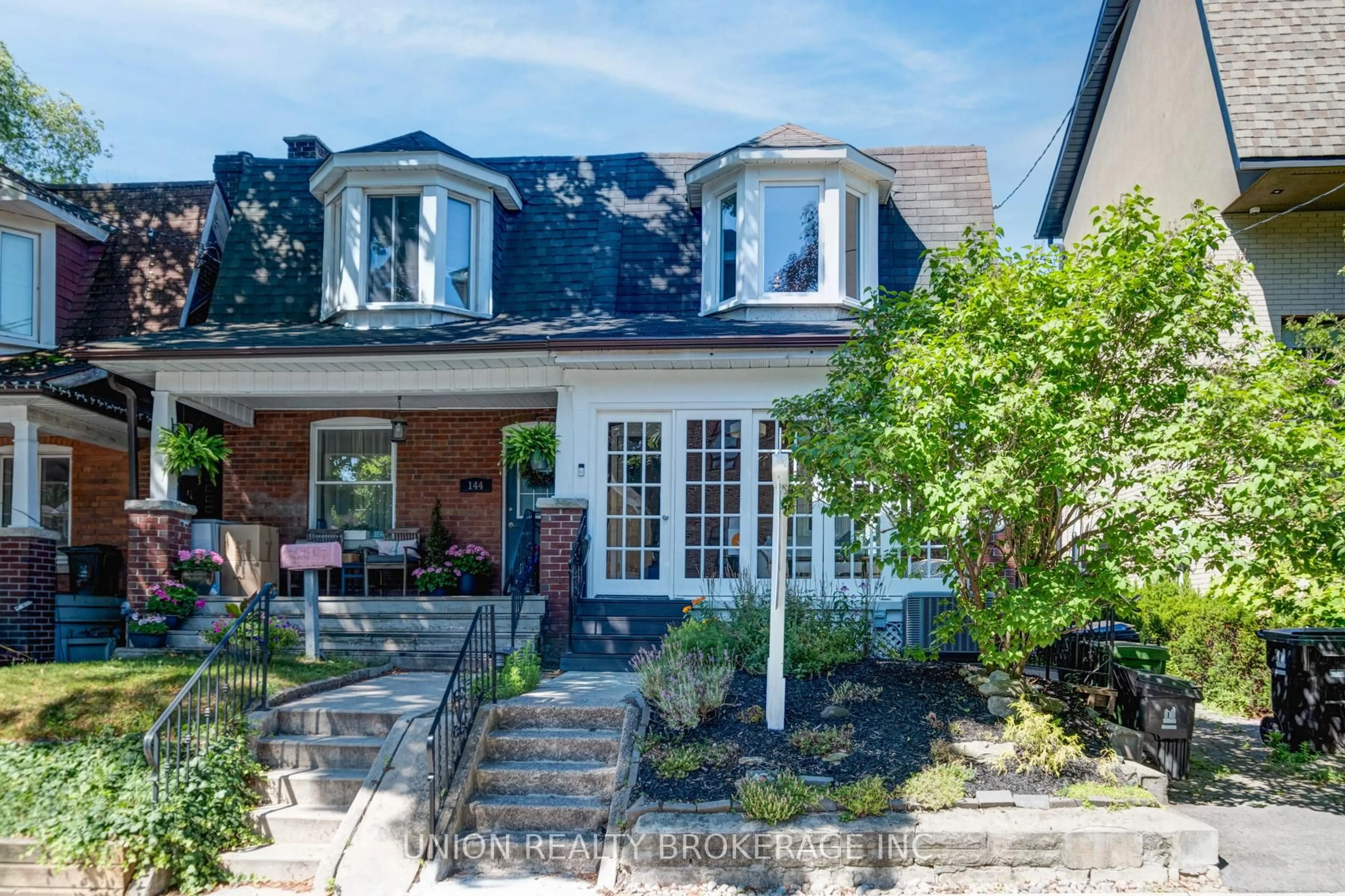 Home with brick exterior material, street for 146 Wheeler Ave, Toronto Ontario M4L 3V4