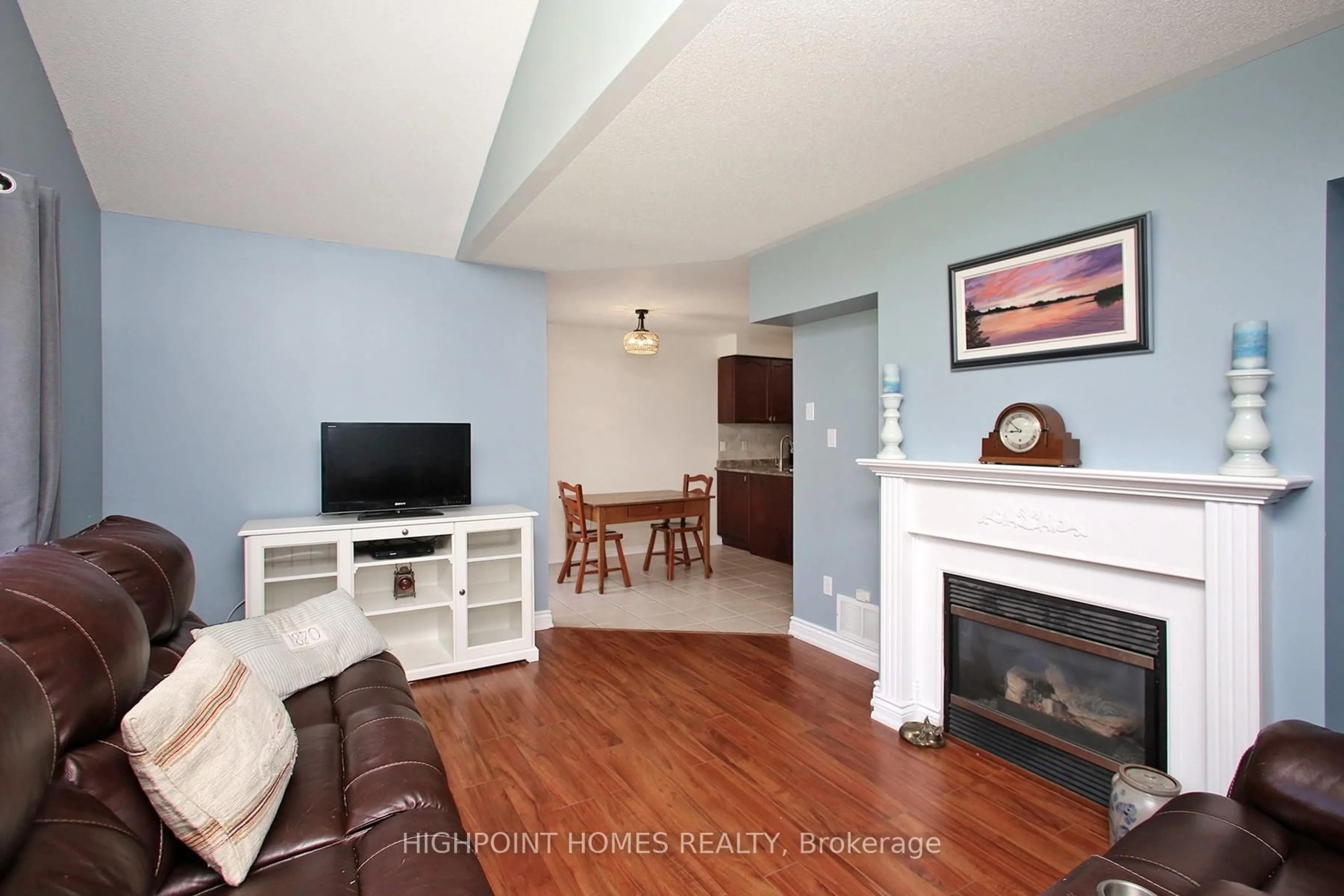 Living room with furniture, wood/laminate floor for 50 Beachgrove Cres, Whitby Ontario L1R 3G3