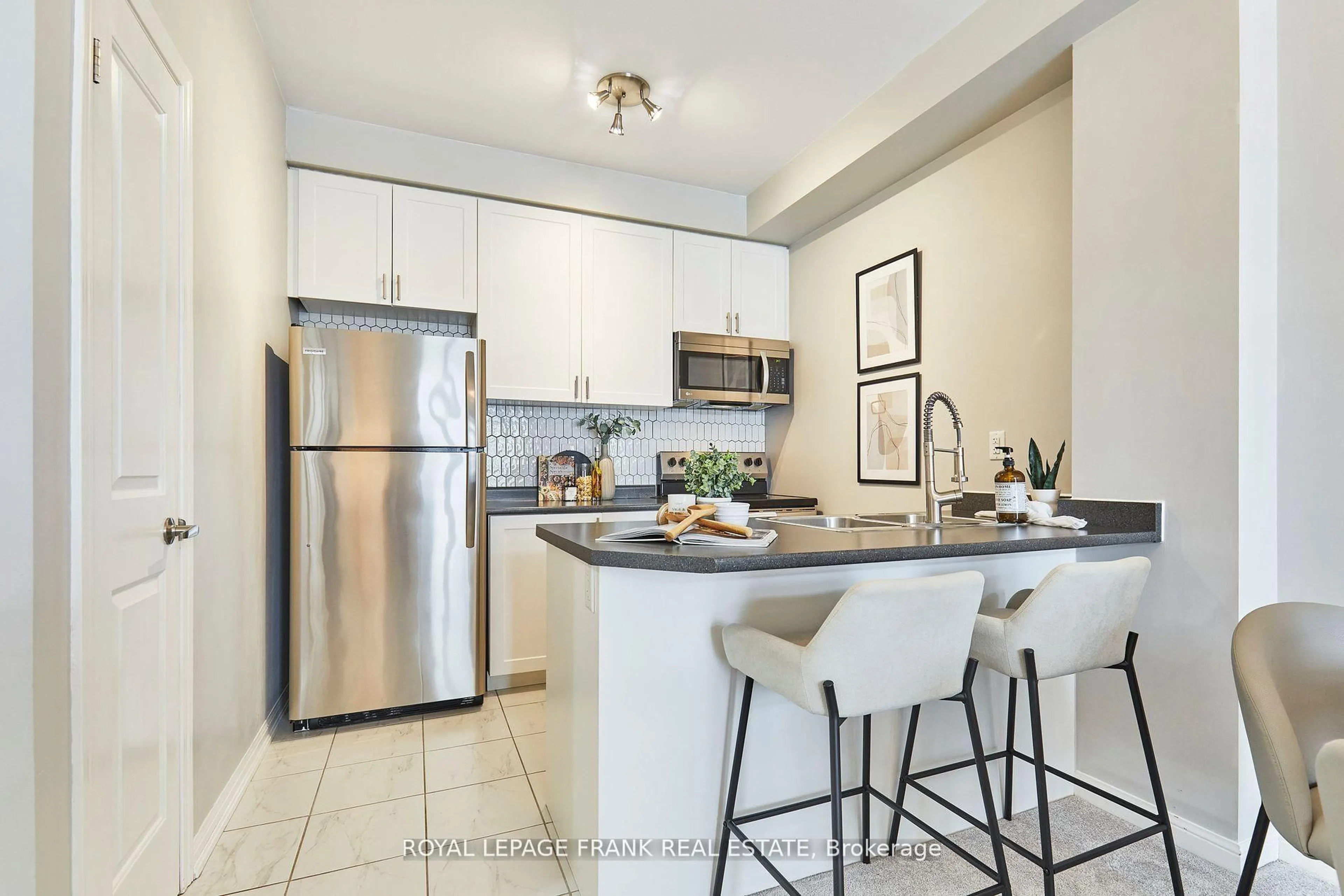 Standard kitchen, ceramic/tile floor for 84 Aspen Springs Dr #112, Clarington Ontario L1C 0V3