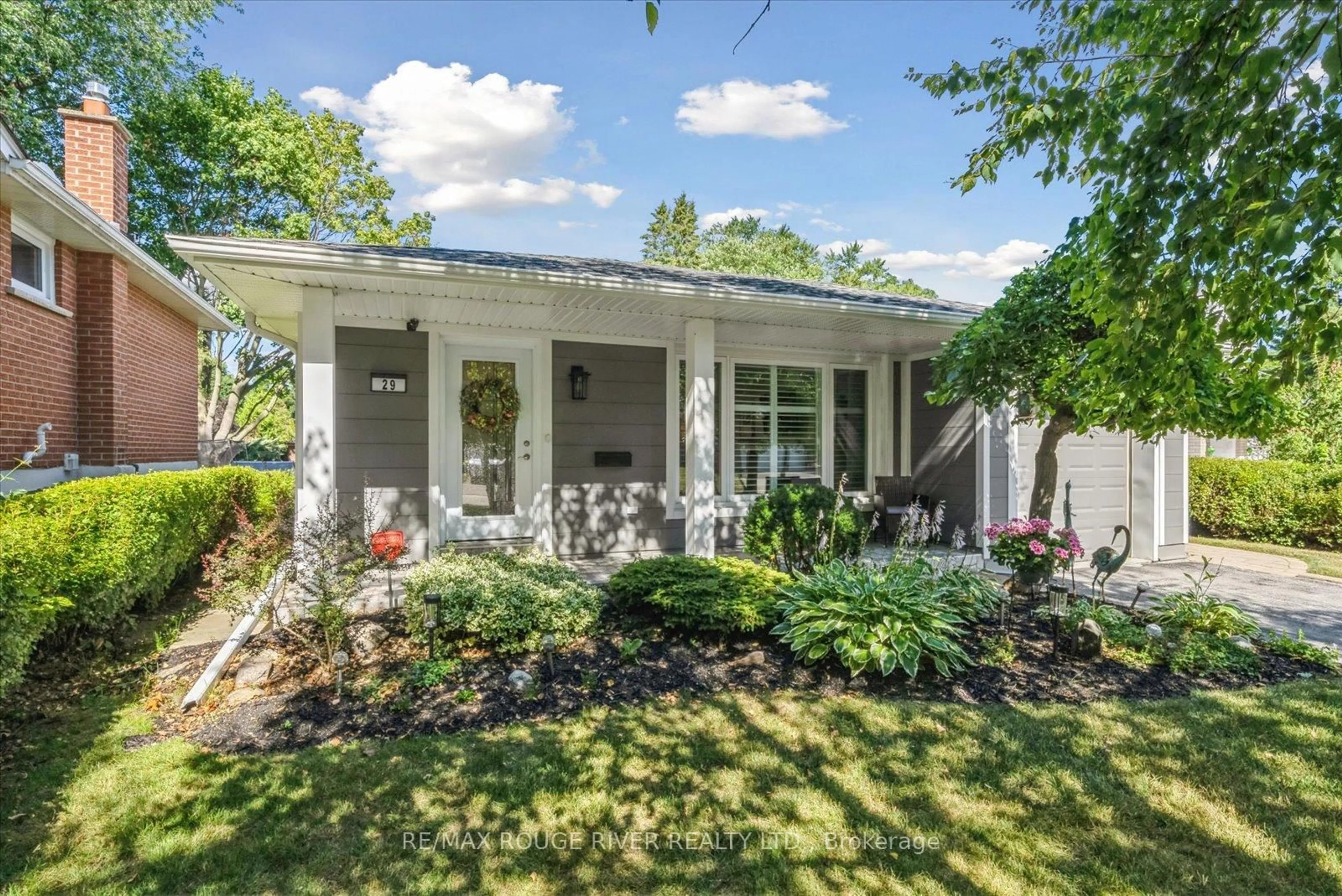 Home with vinyl exterior material, street for 29 Rodarick Dr, Toronto Ontario M1C 1W4