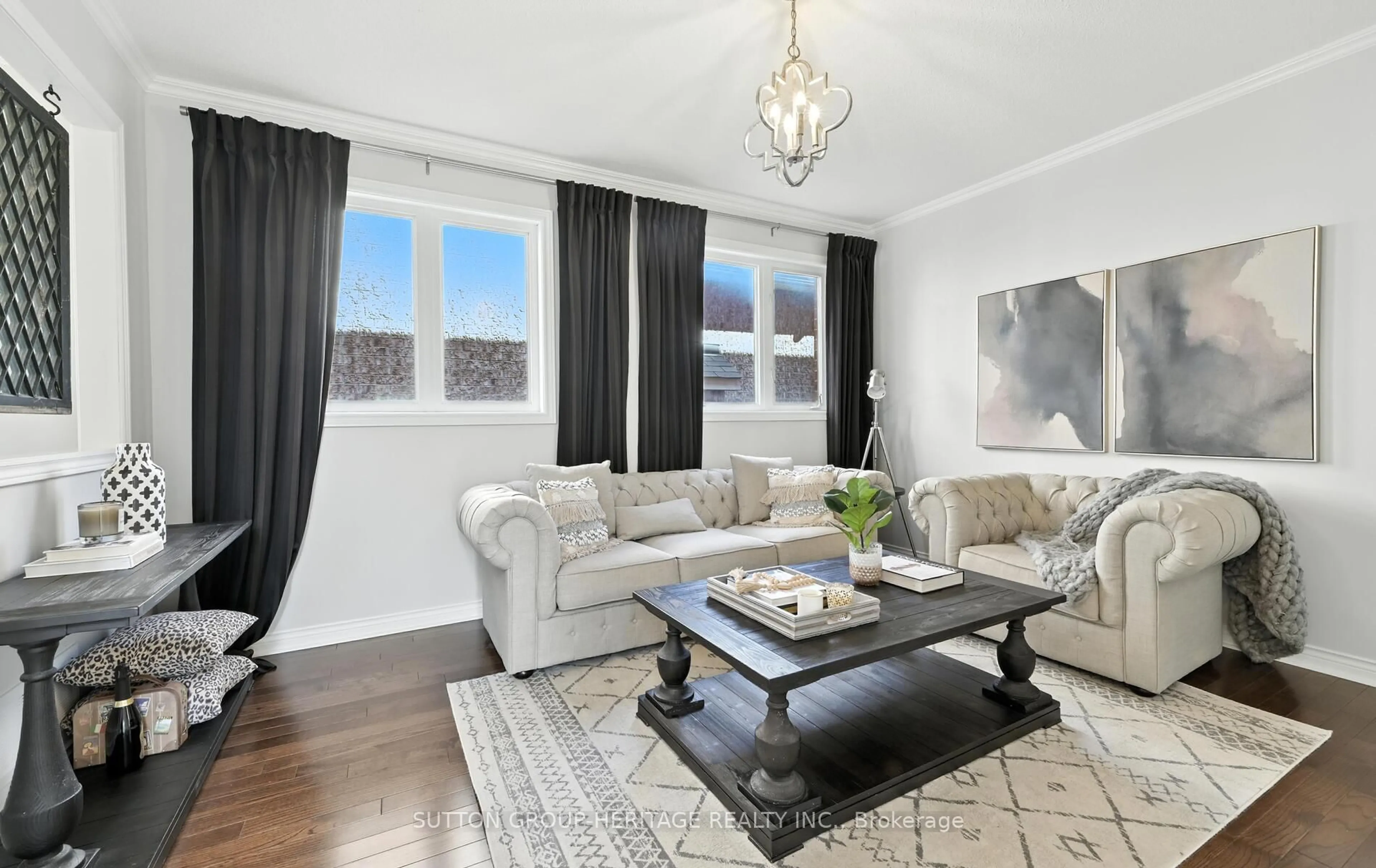 Living room with furniture, wood/laminate floor for 30 Bradford Crt, Whitby Ontario L1N 0G7