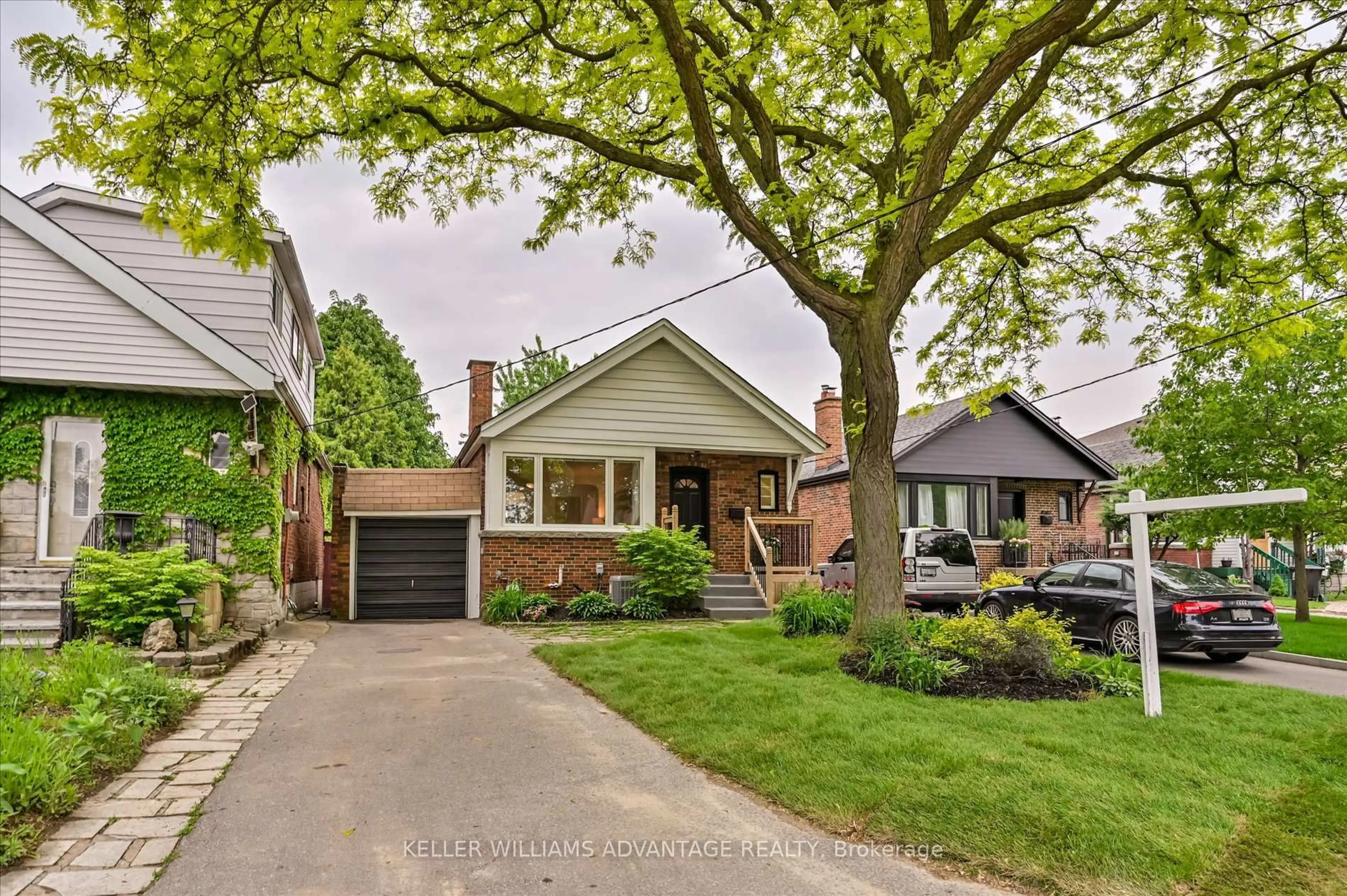 Home with brick exterior material, street for 1080 Greenwood Ave, Toronto Ontario M4J 4E4