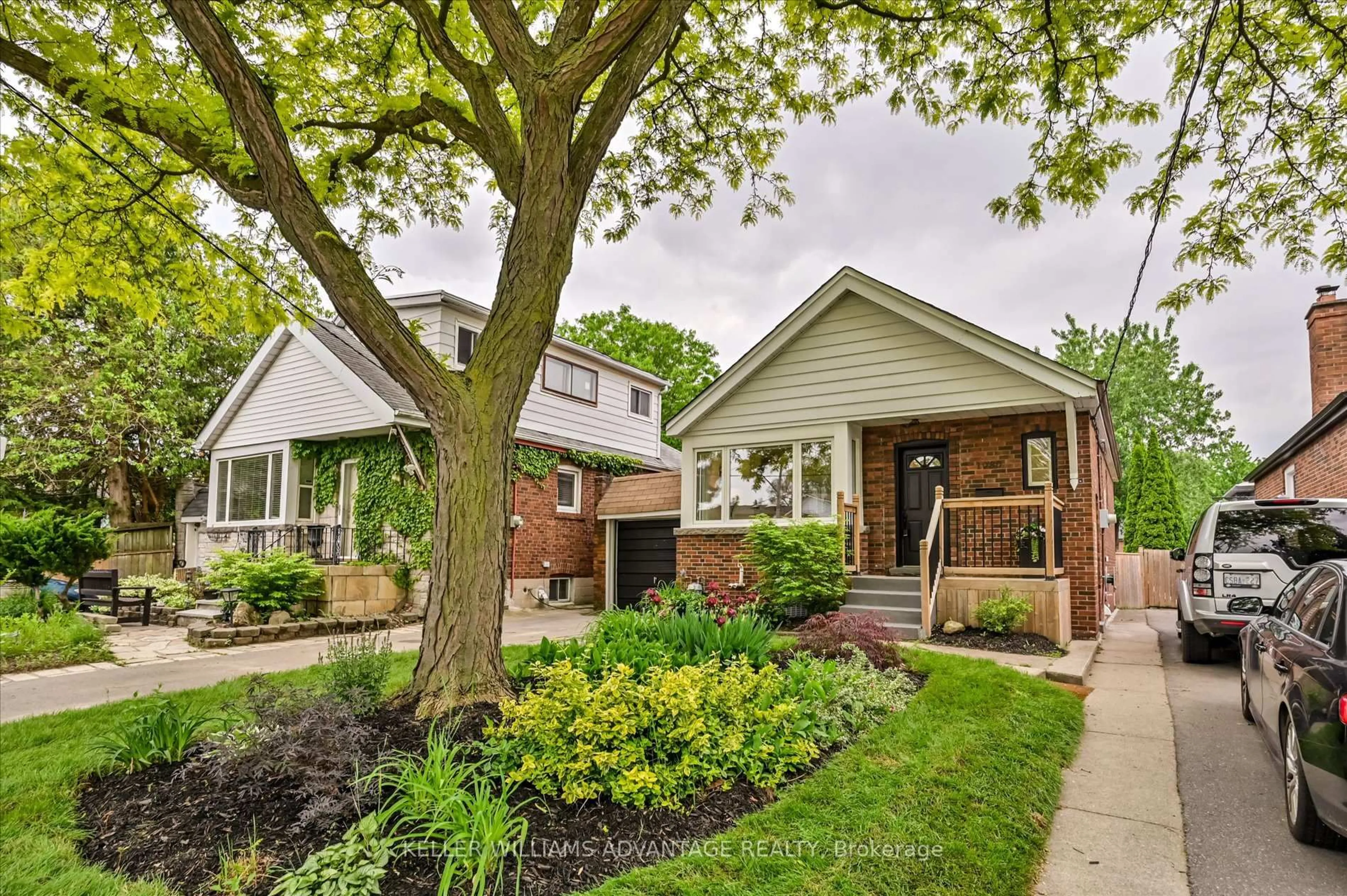 Home with brick exterior material, street for 1080 Greenwood Ave, Toronto Ontario M4J 4E4