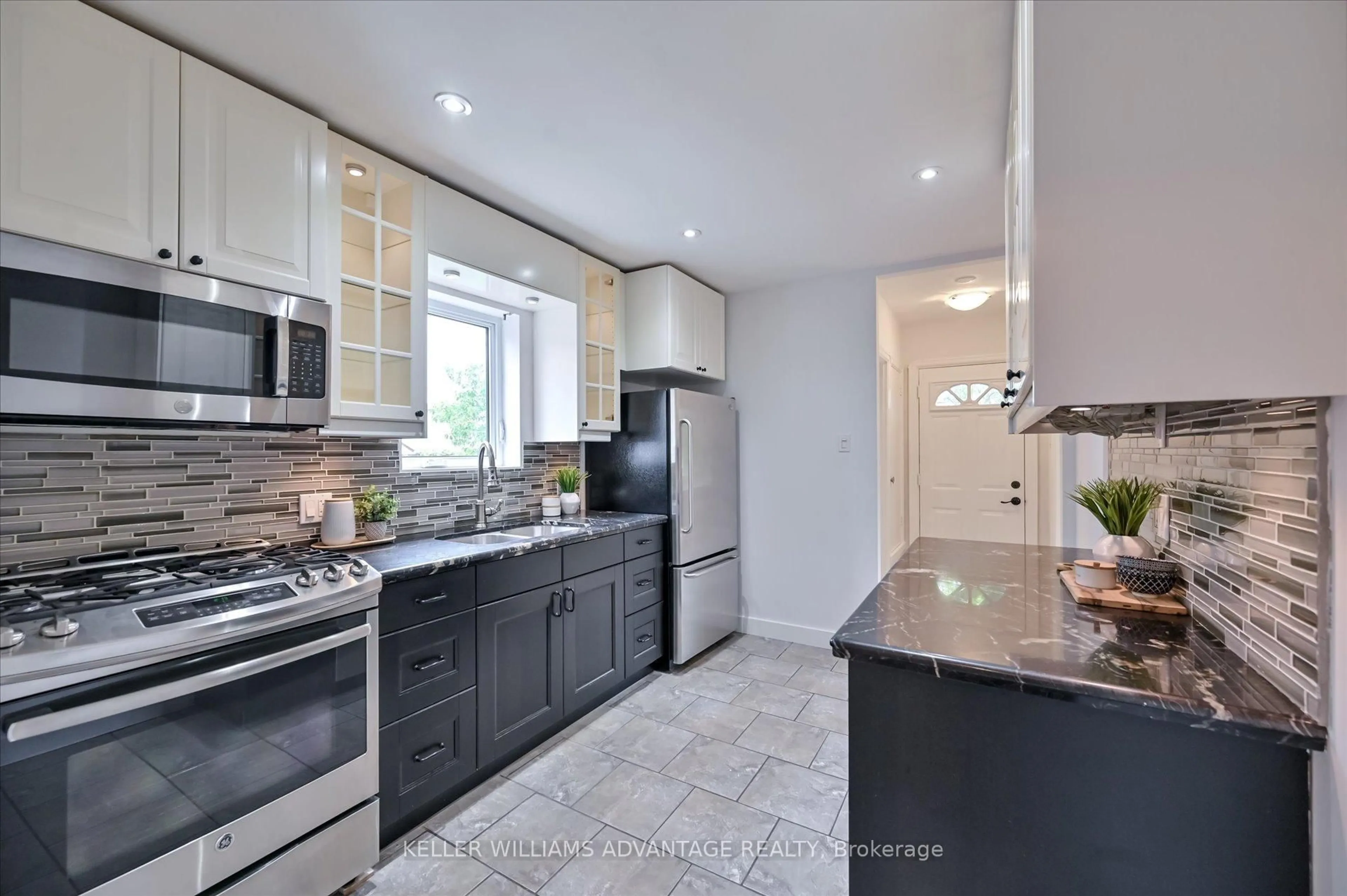 Contemporary kitchen, ceramic/tile floor for 1080 Greenwood Ave, Toronto Ontario M4J 4E4