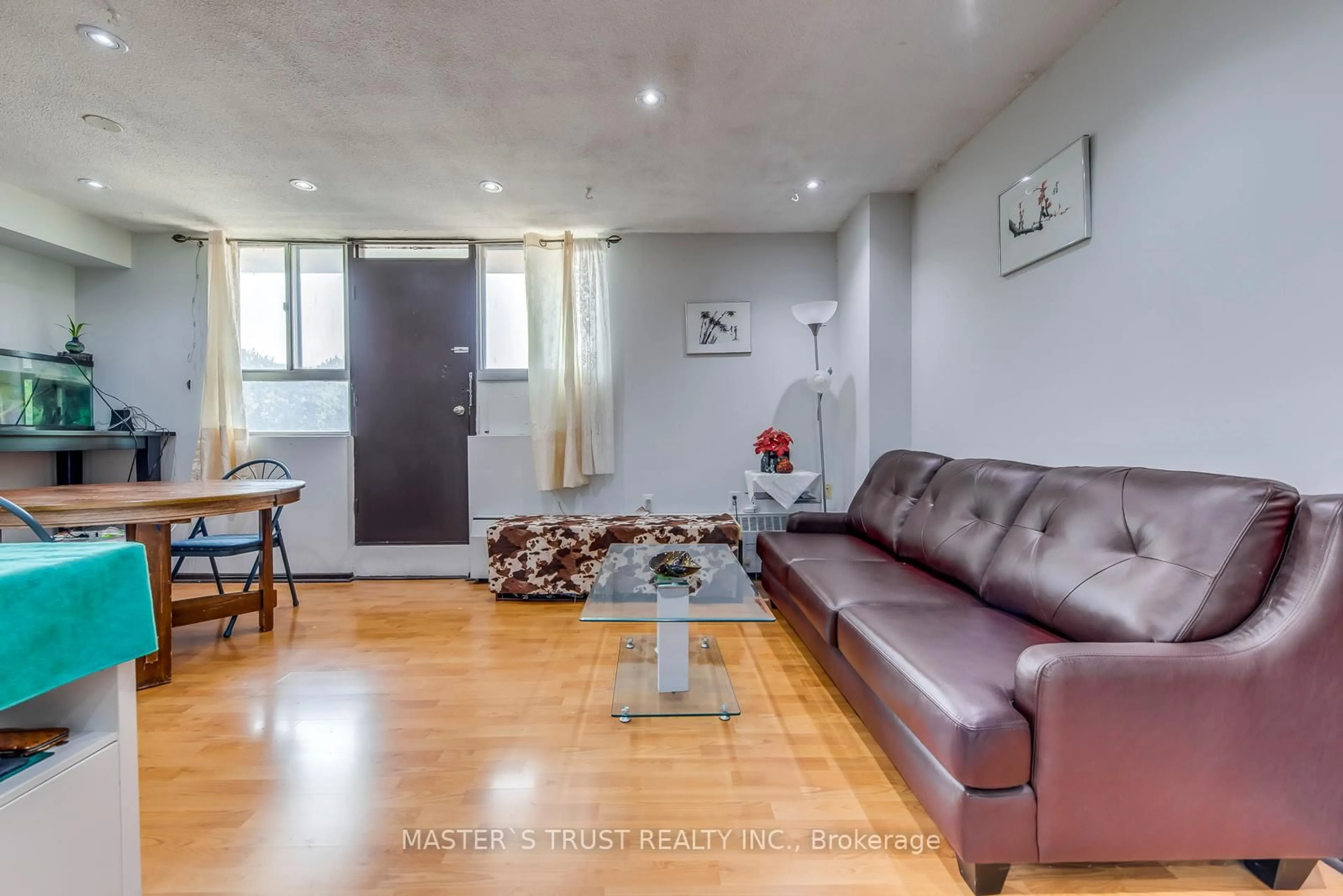 Living room with furniture, unknown for 100 Dundalk Dr #214, Toronto Ontario M1P 4V2