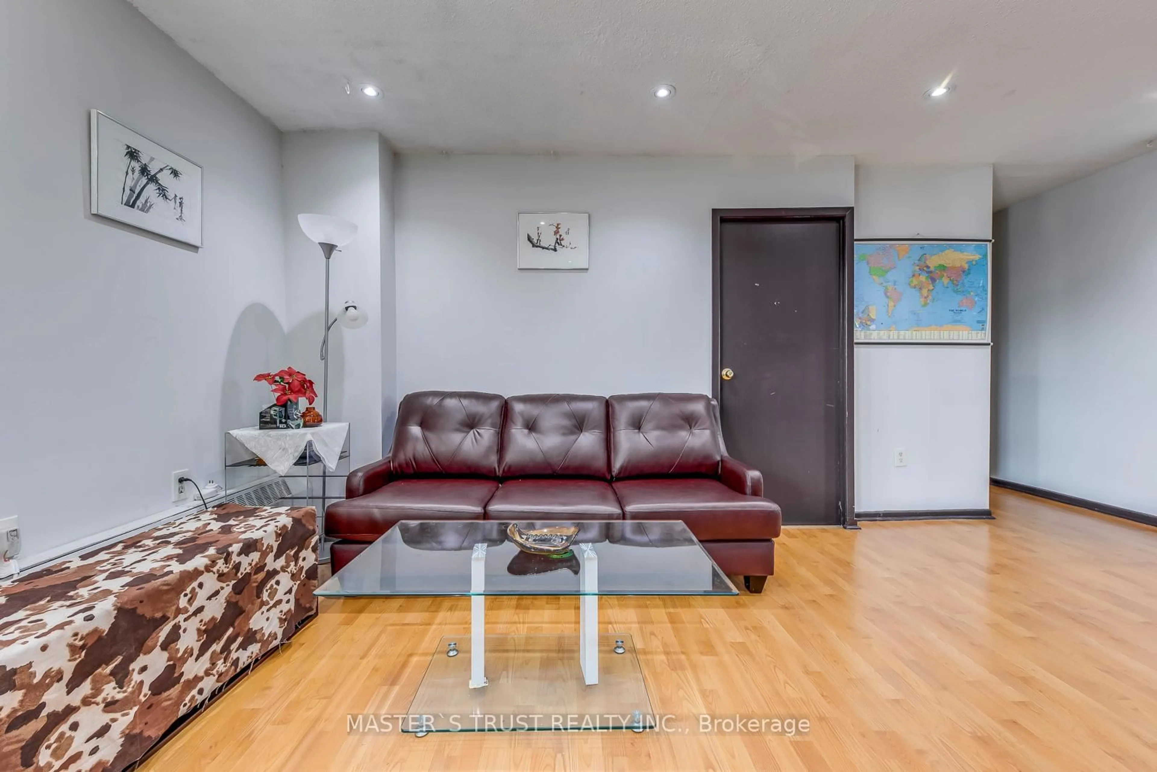 Living room with furniture, wood/laminate floor for 100 Dundalk Dr #214, Toronto Ontario M1P 4V2