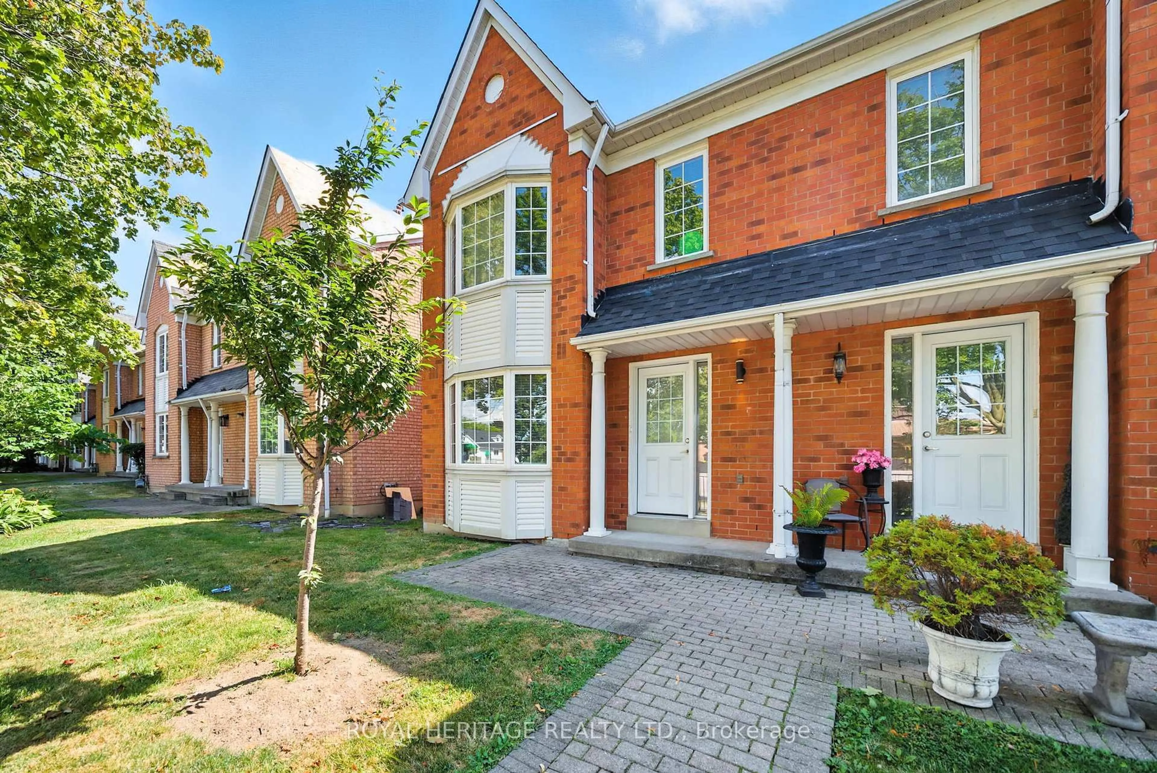 Home with brick exterior material, street for 10 Bassett Blvd #95, Whitby Ontario L1N 9C5