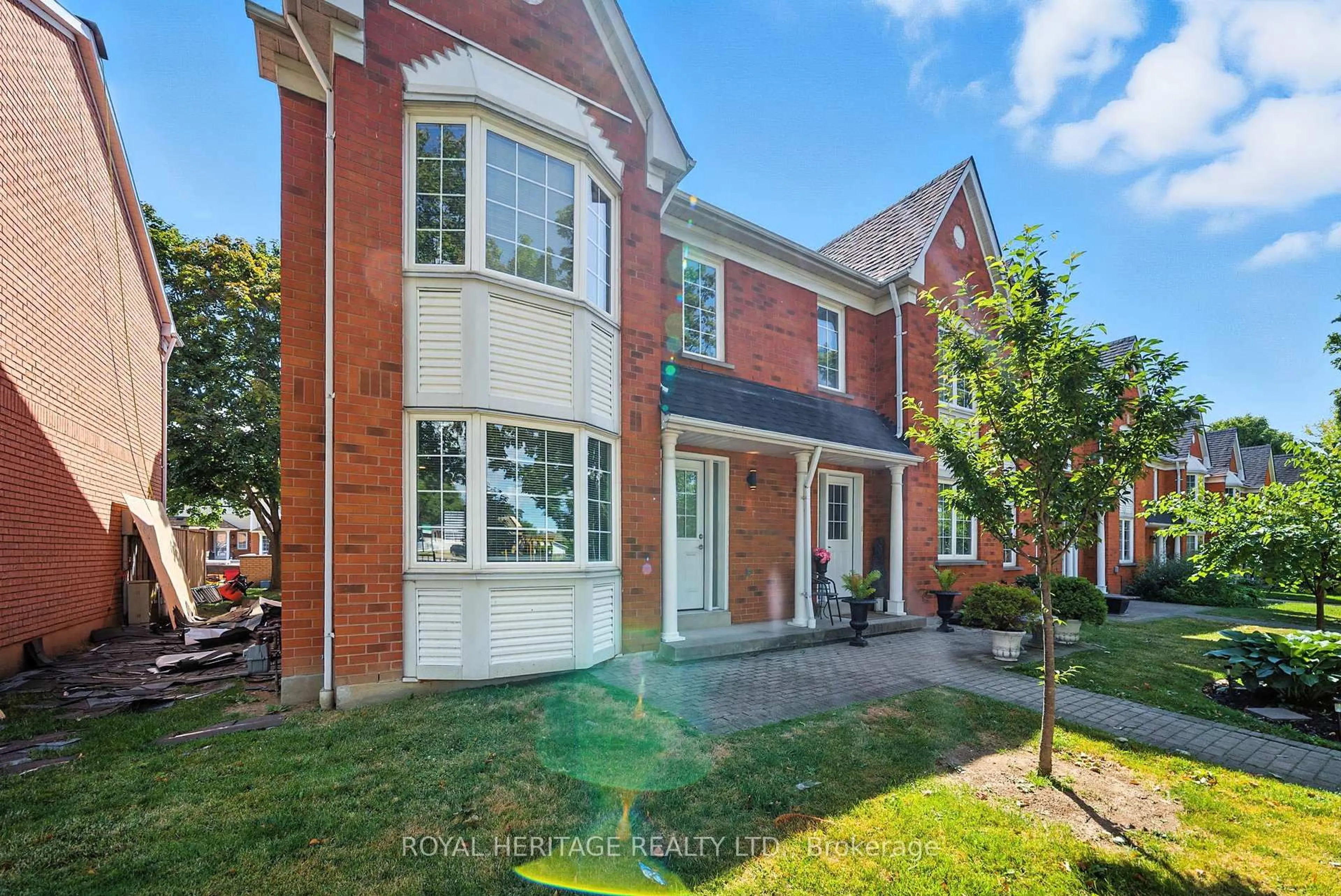 Home with brick exterior material, street for 10 Bassett Blvd #95, Whitby Ontario L1N 9C5