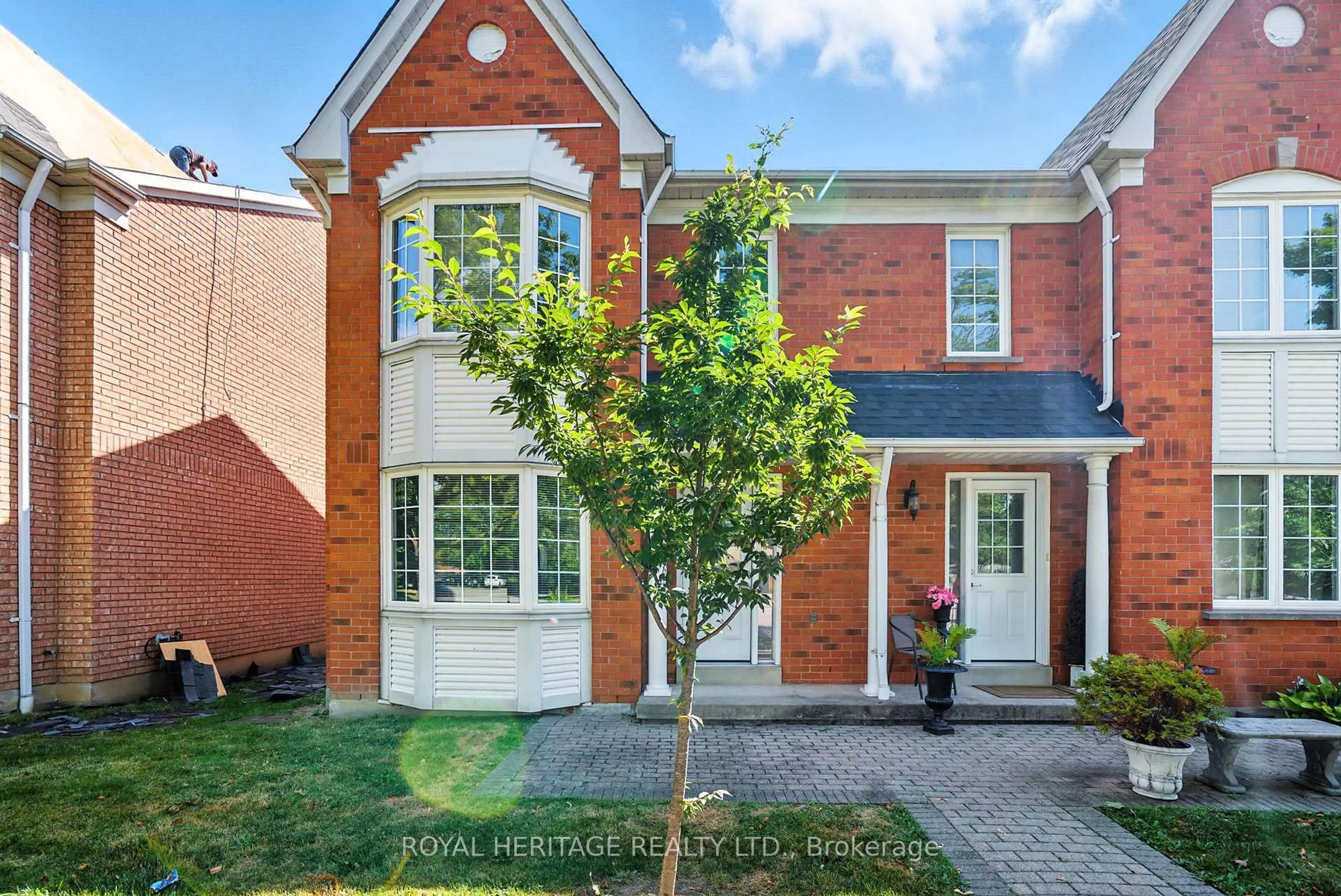 Home with brick exterior material, street for 10 Bassett Blvd #95, Whitby Ontario L1N 9C5