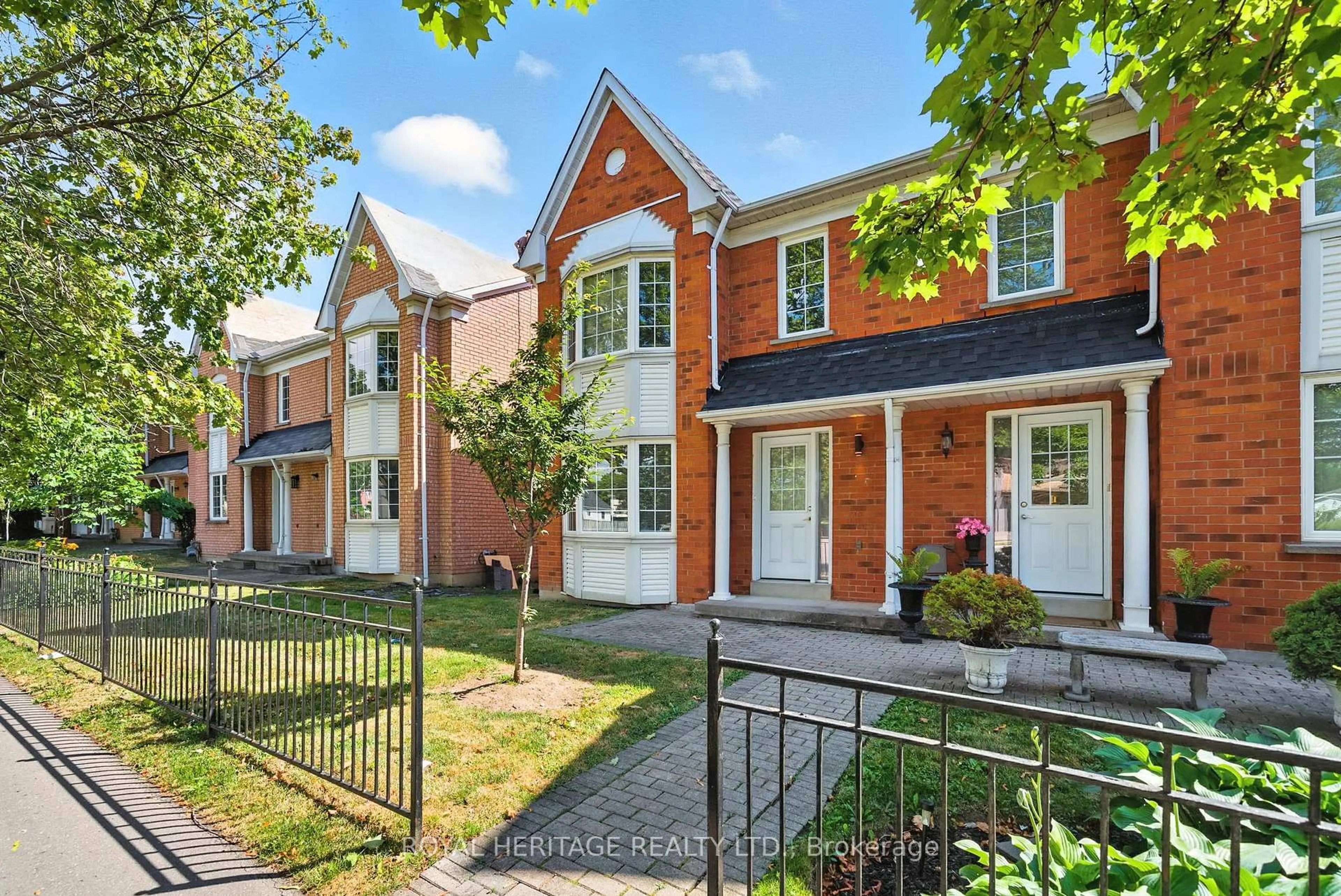 Home with brick exterior material, street for 10 Bassett Blvd #95, Whitby Ontario L1N 9C5