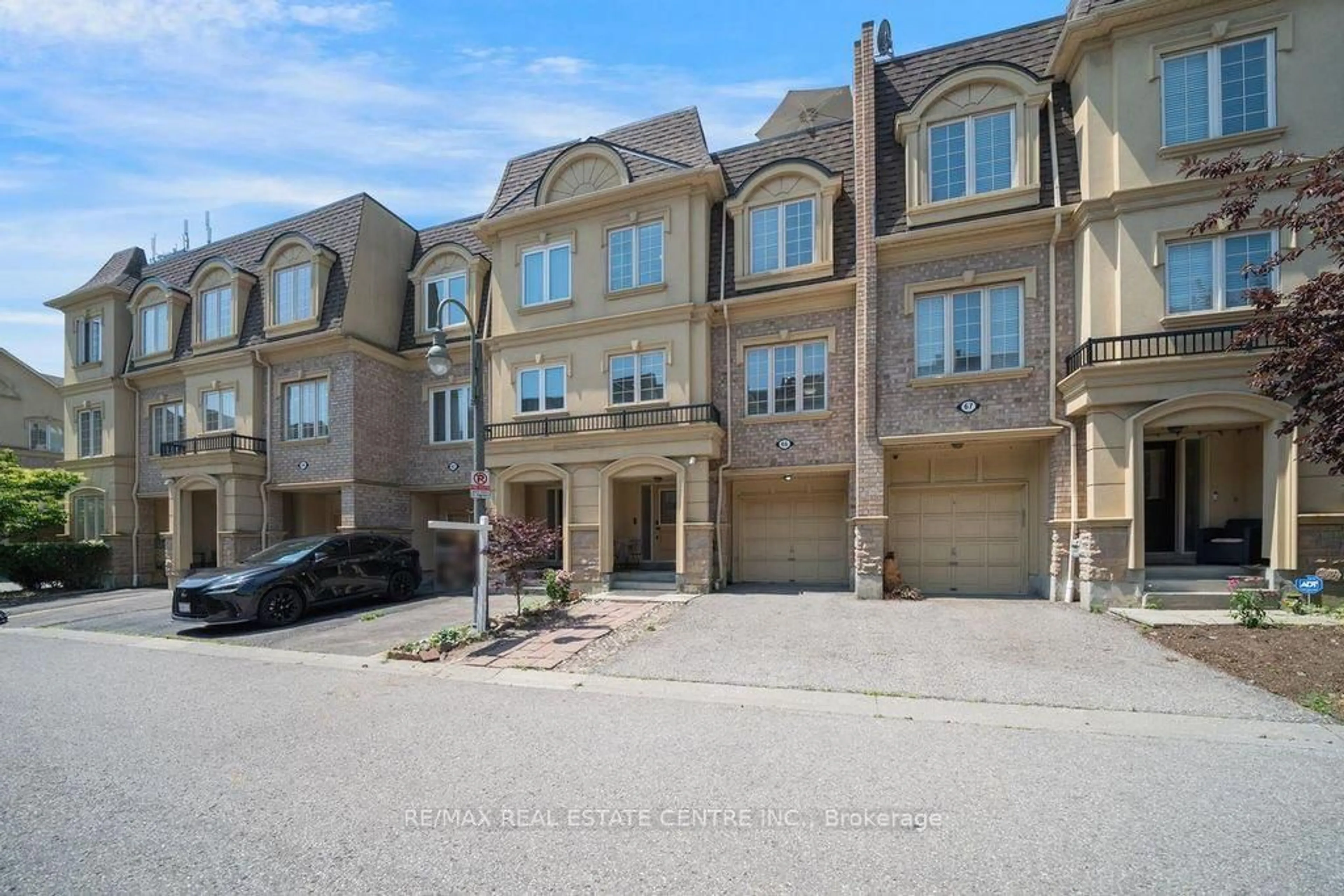 A pic from outside/outdoor area/front of a property/back of a property/a pic from drone, street for 1250 St. Martins Dr #66, Pickering Ontario L1W 0A2