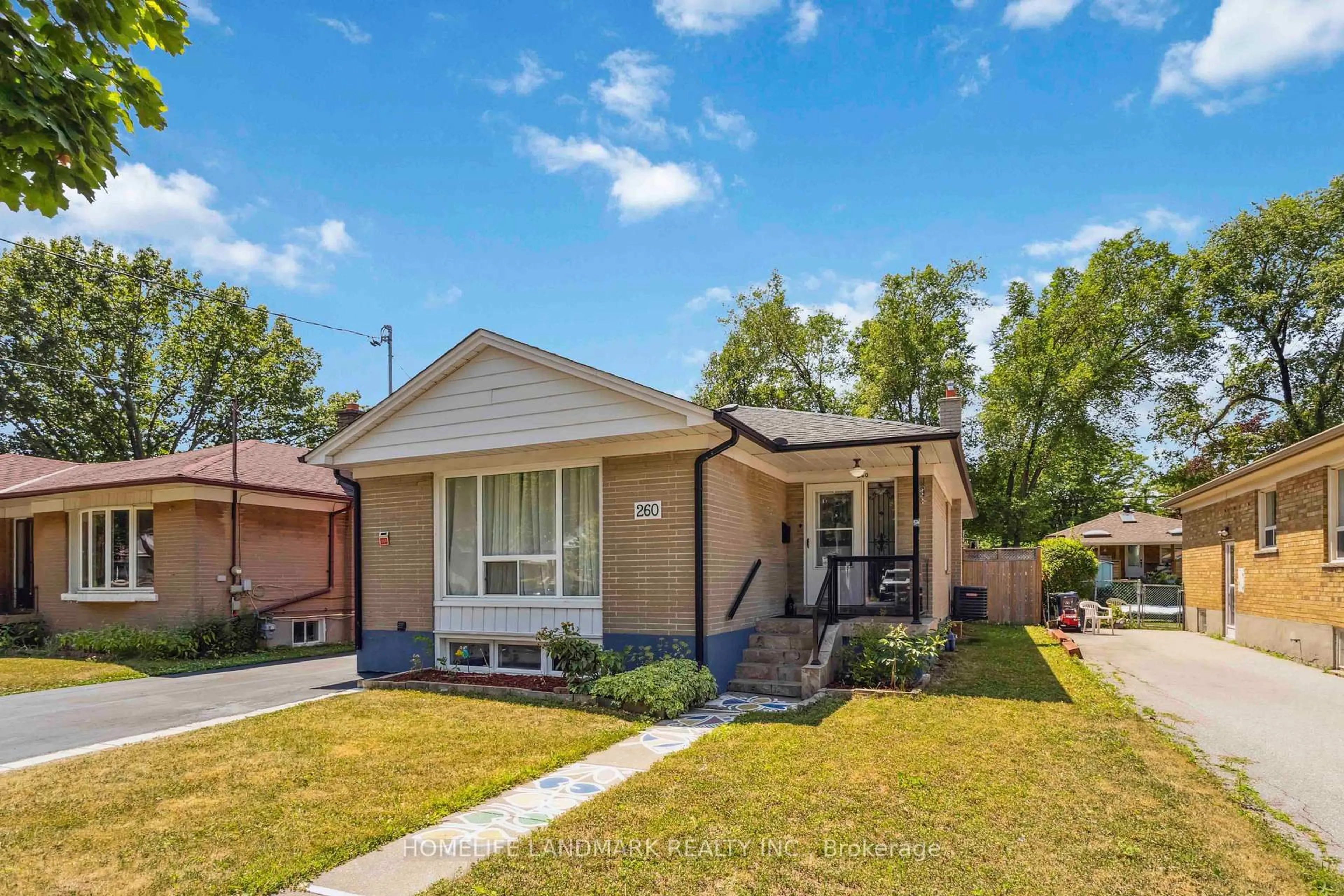 Home with brick exterior material, street for 260 Chine Dr, Toronto Ontario M1M 2L8