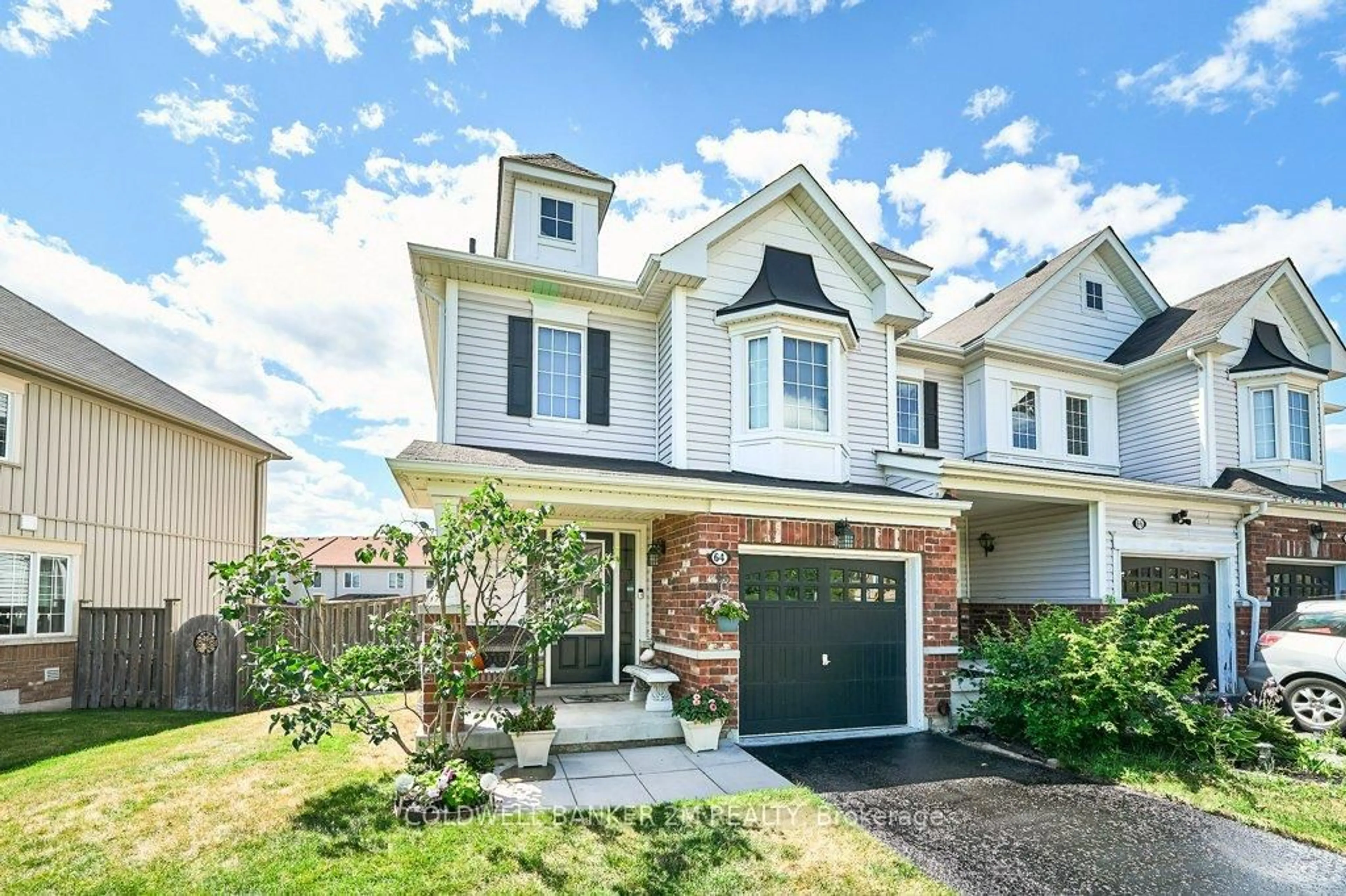 Home with brick exterior material, street for 64 Adanac Dr, Whitby Ontario L1N 0J3