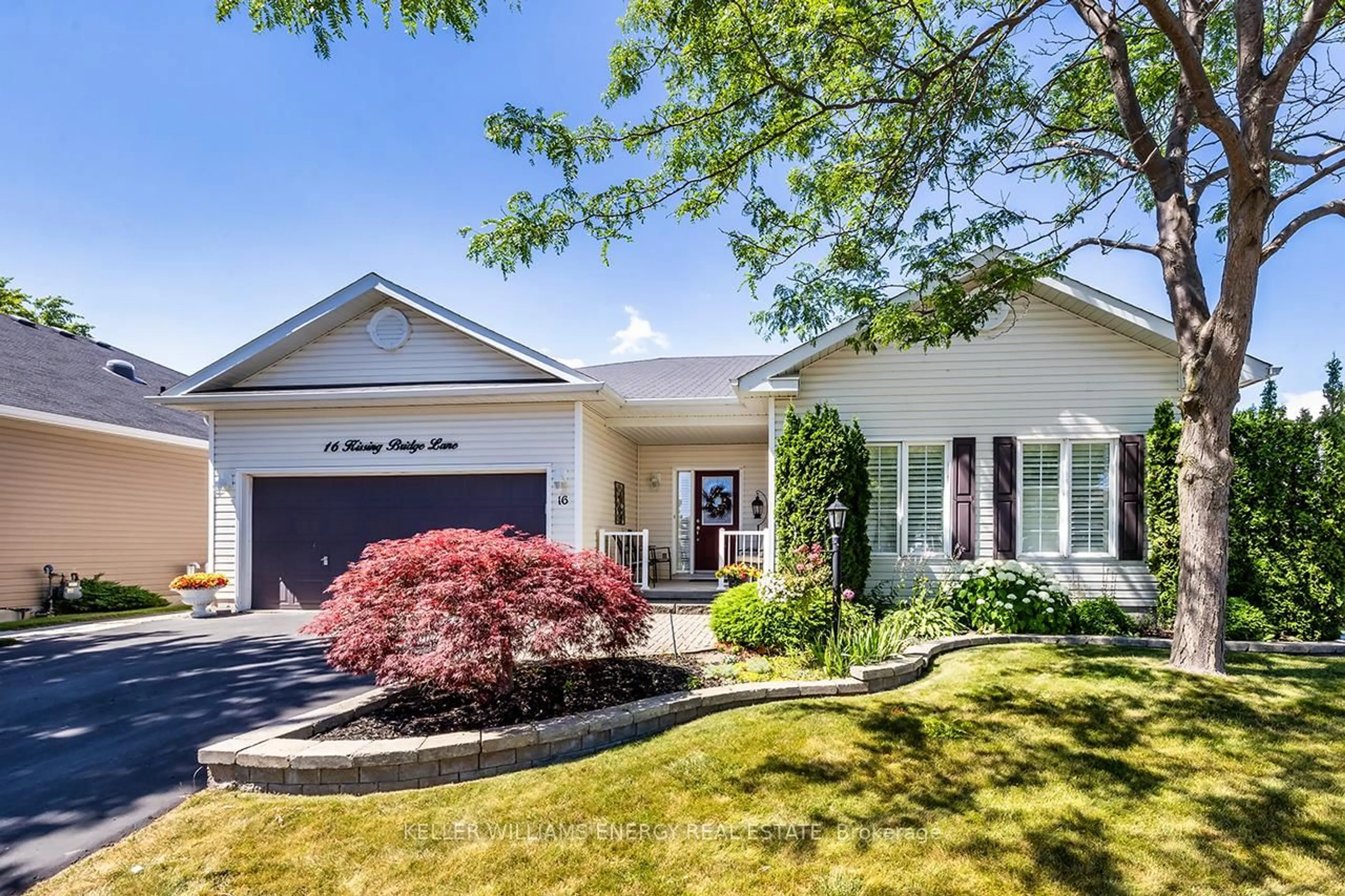 Home with vinyl exterior material, street for 16 Kissingbridge Lane, Clarington Ontario L1B 0B2