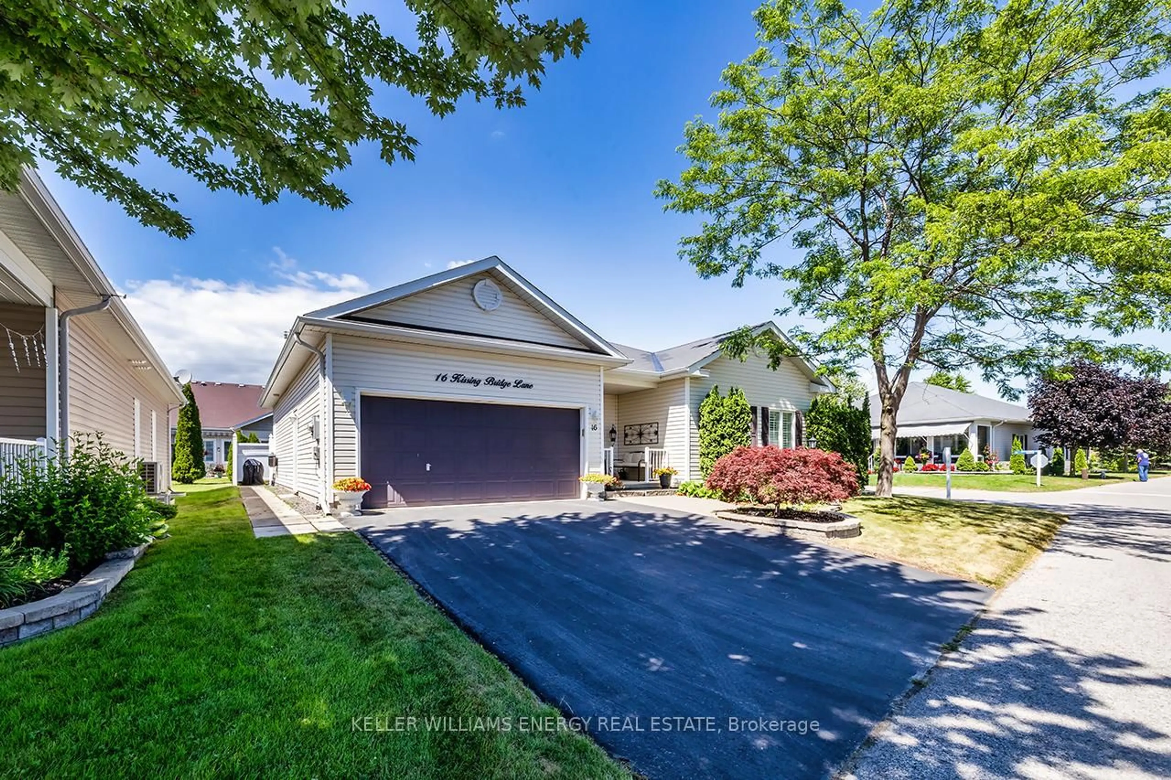 Home with vinyl exterior material, street for 16 Kissingbridge Lane, Clarington Ontario L1B 0B2