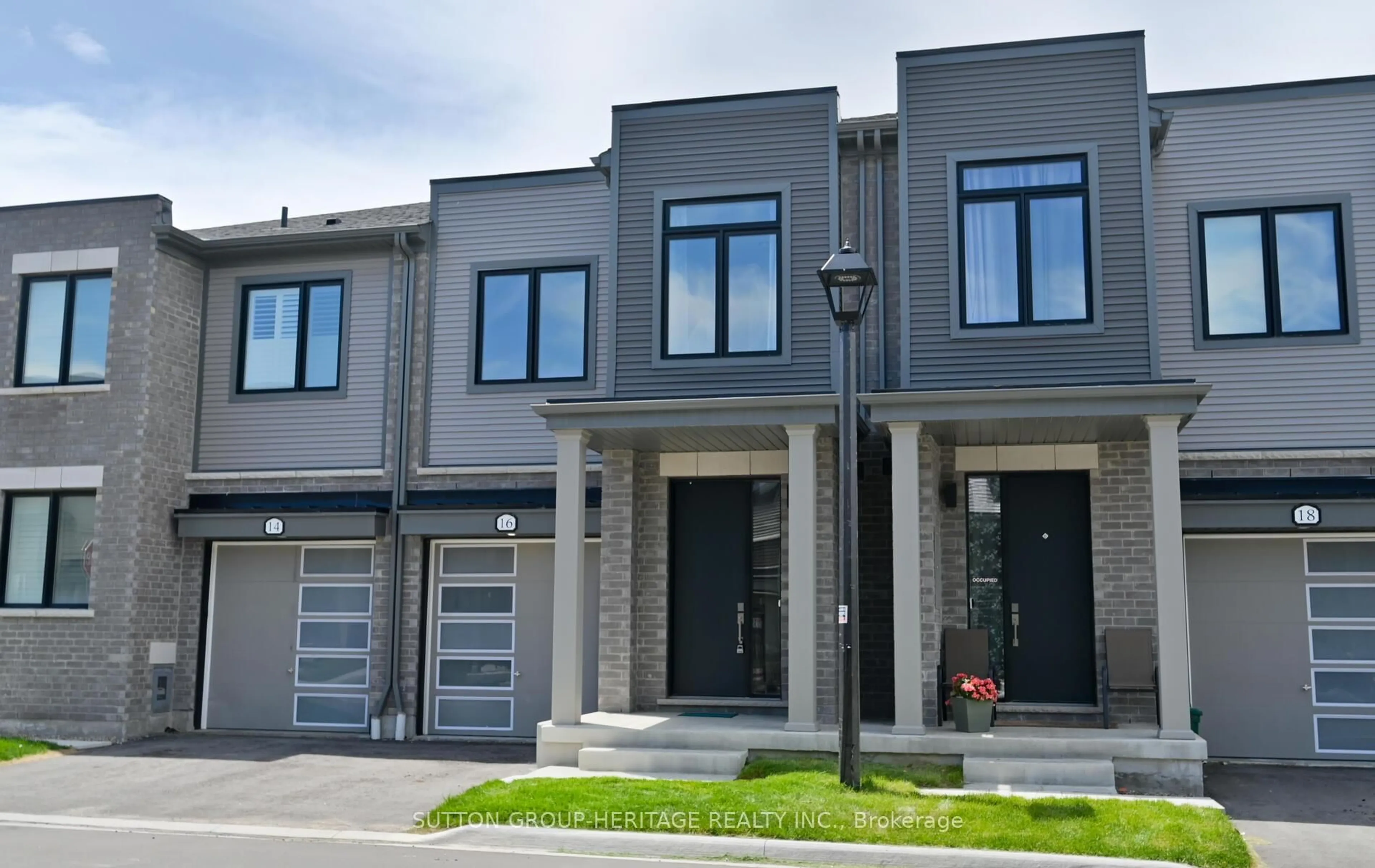 Home with brick exterior material, street for 16 Sorbara Way, Whitby Ontario L1M 2L1