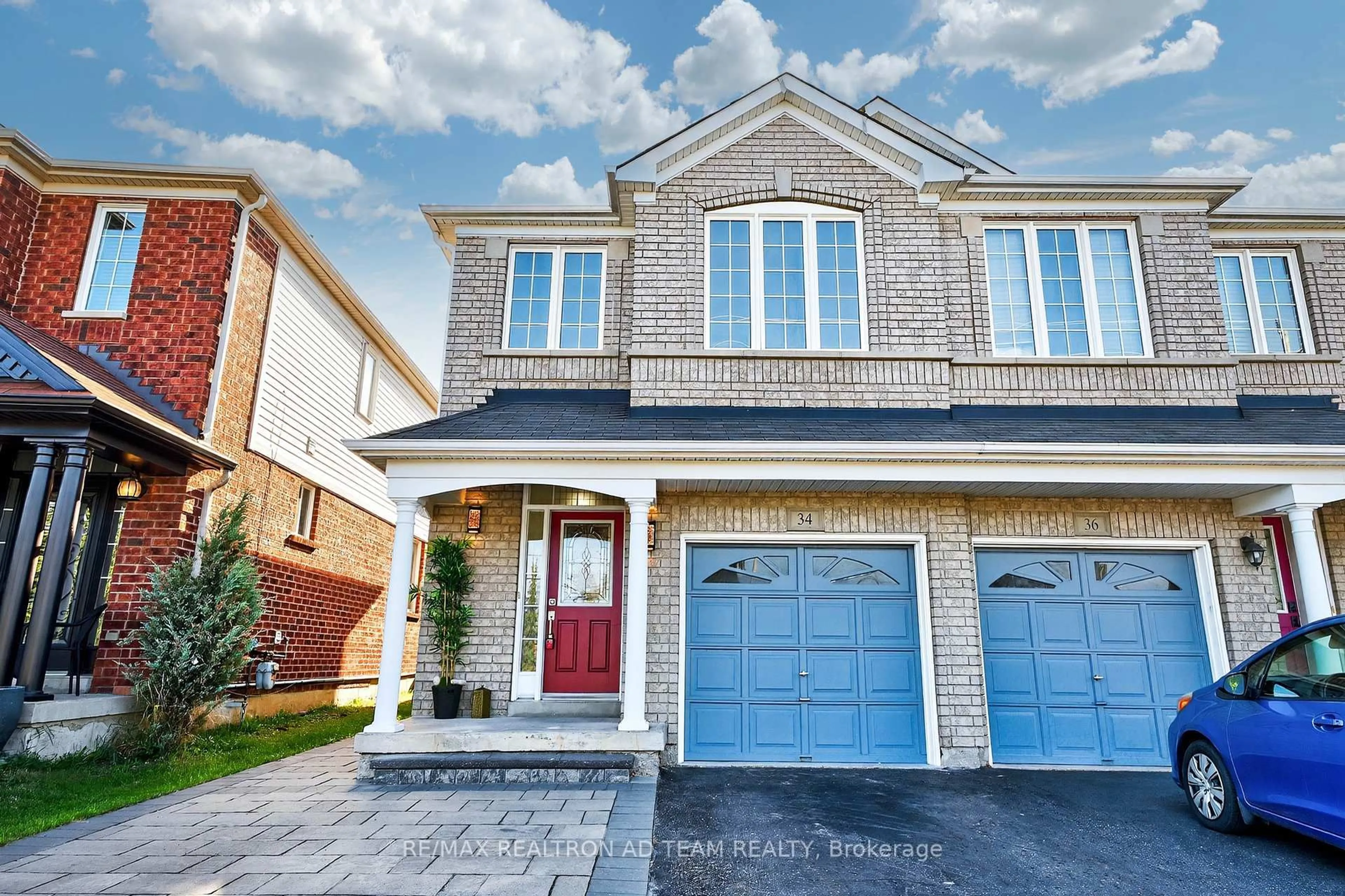 Home with brick exterior material, street for 34 Unsworth Cres, Ajax Ontario L1T 4X3