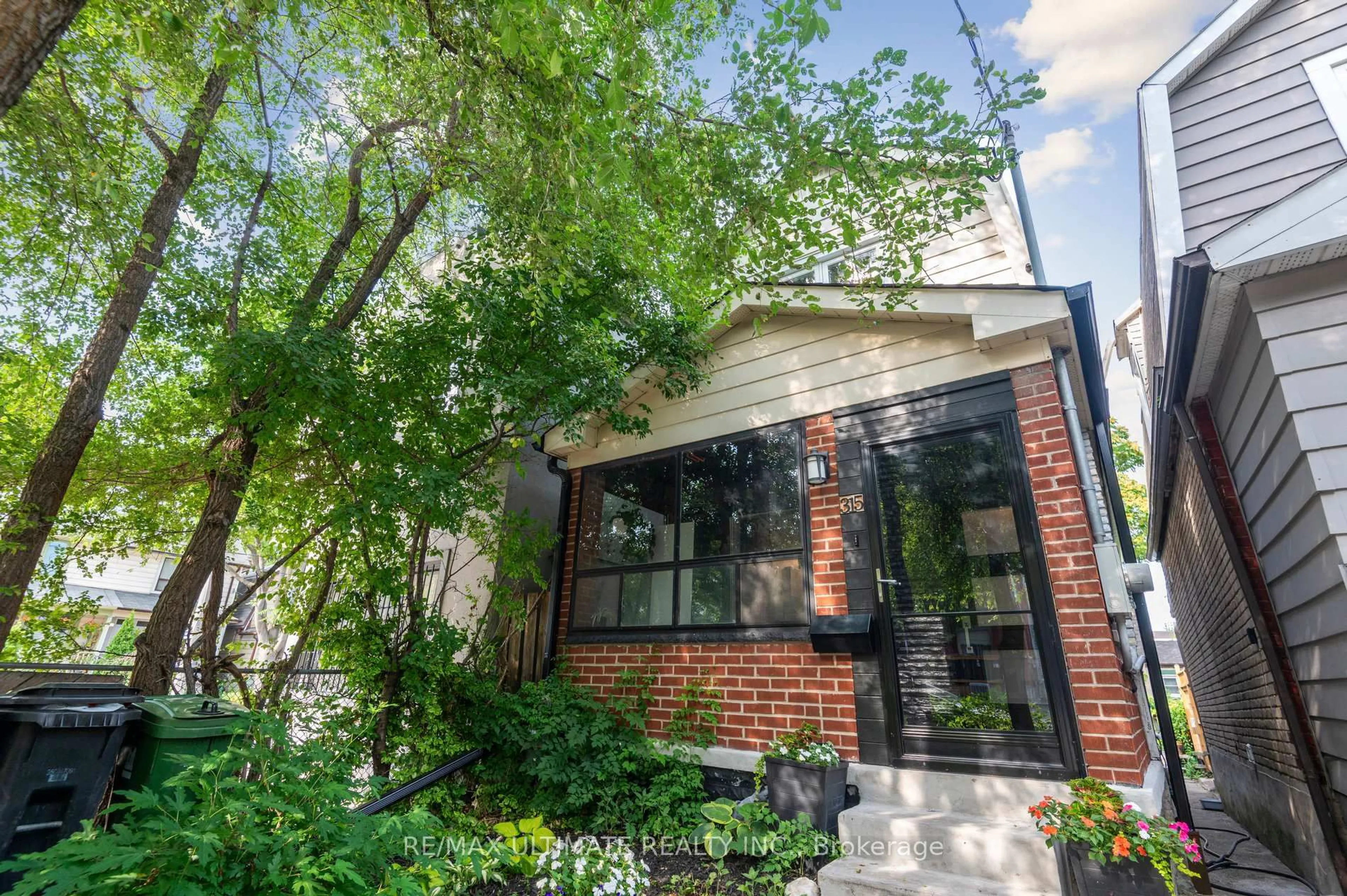 Home with brick exterior material, street for 315 Cedarvale Ave, Toronto Ontario M4C 4K3