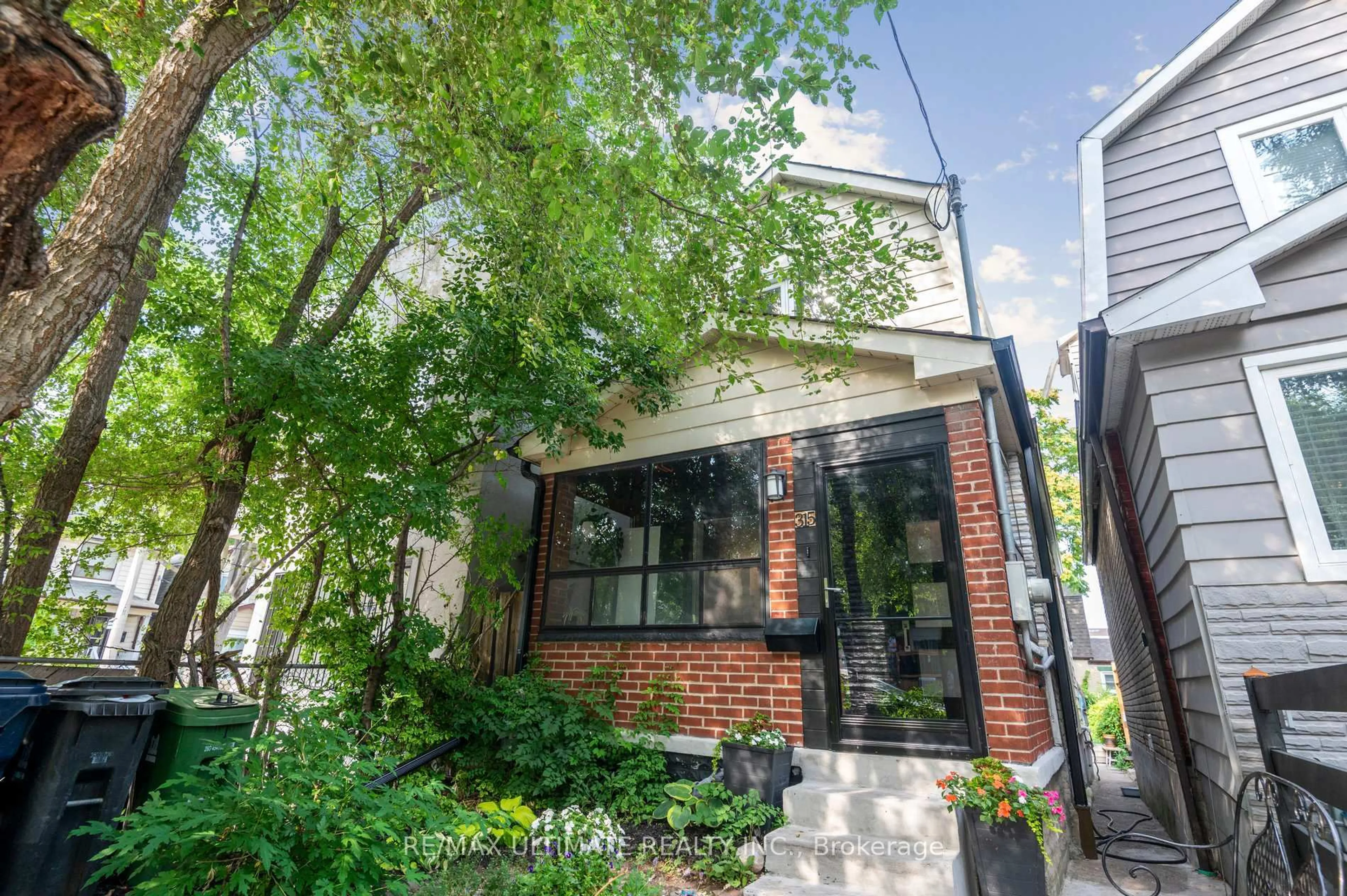 Home with brick exterior material, street for 315 Cedarvale Ave, Toronto Ontario M4C 4K3