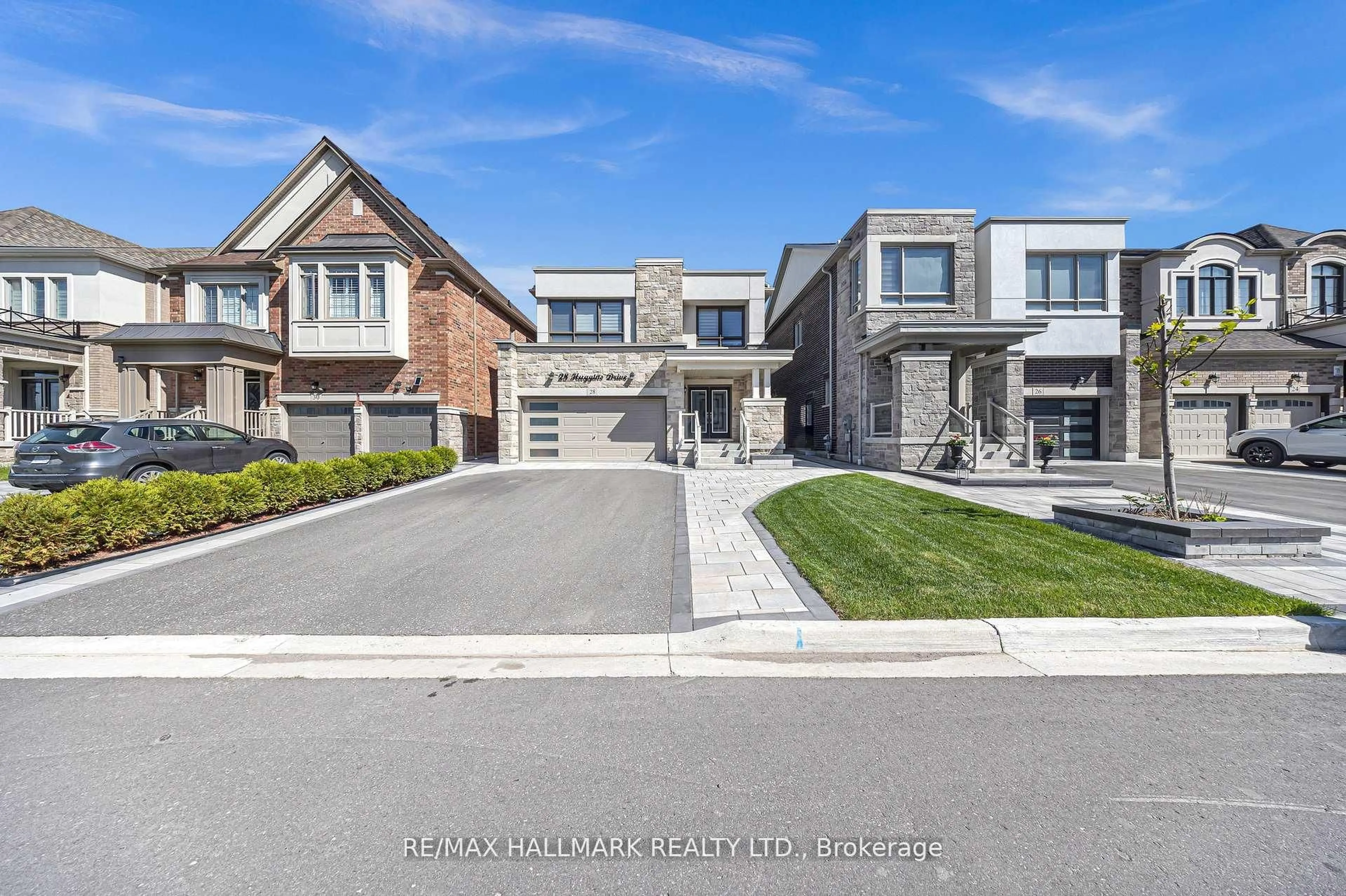 Home with brick exterior material, street for 28 Huggins Dr, Whitby Ontario L1P 0N4