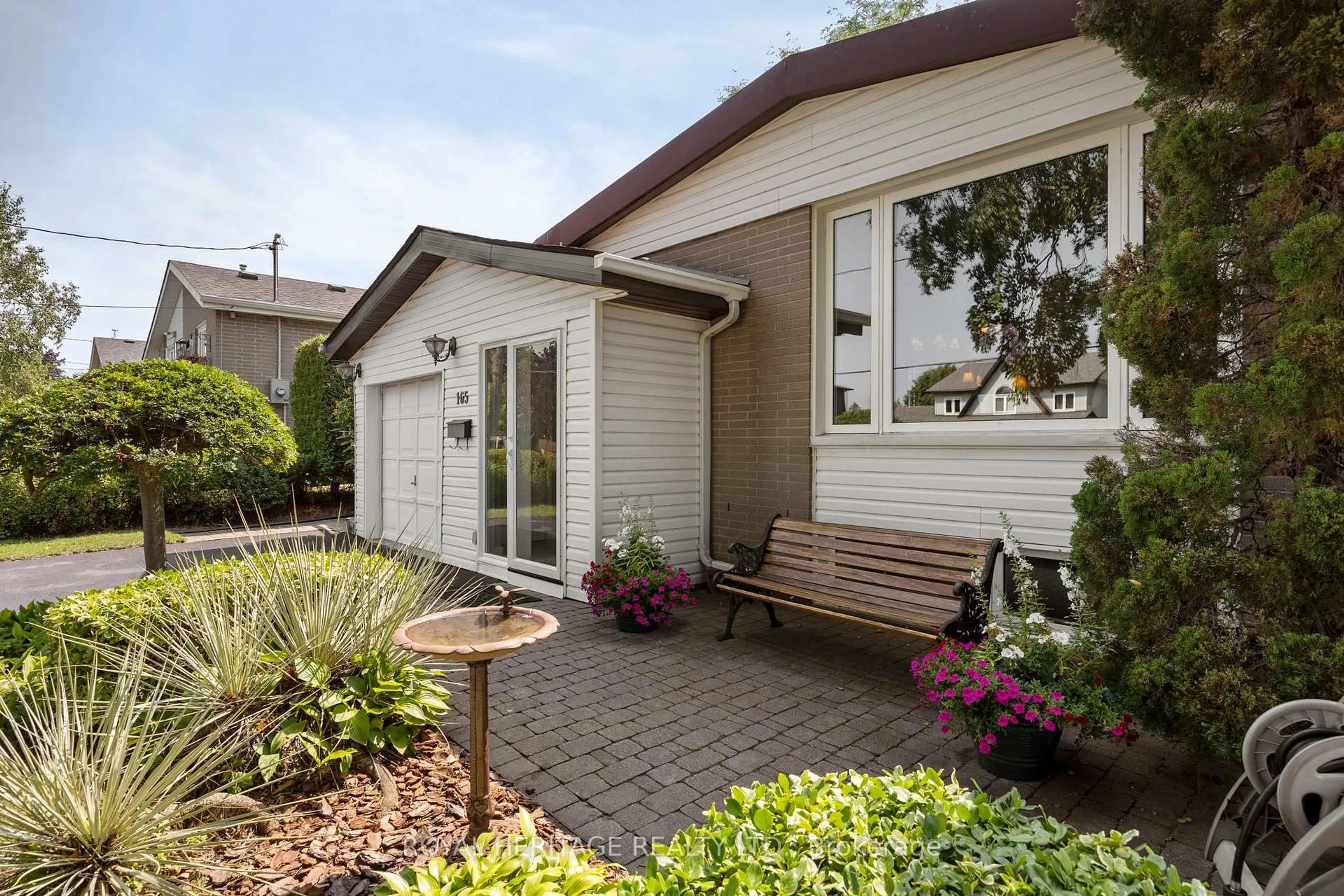 Home with vinyl exterior material, street for 165 Hillcrest Dr, Whitby Ontario L1N 3C3