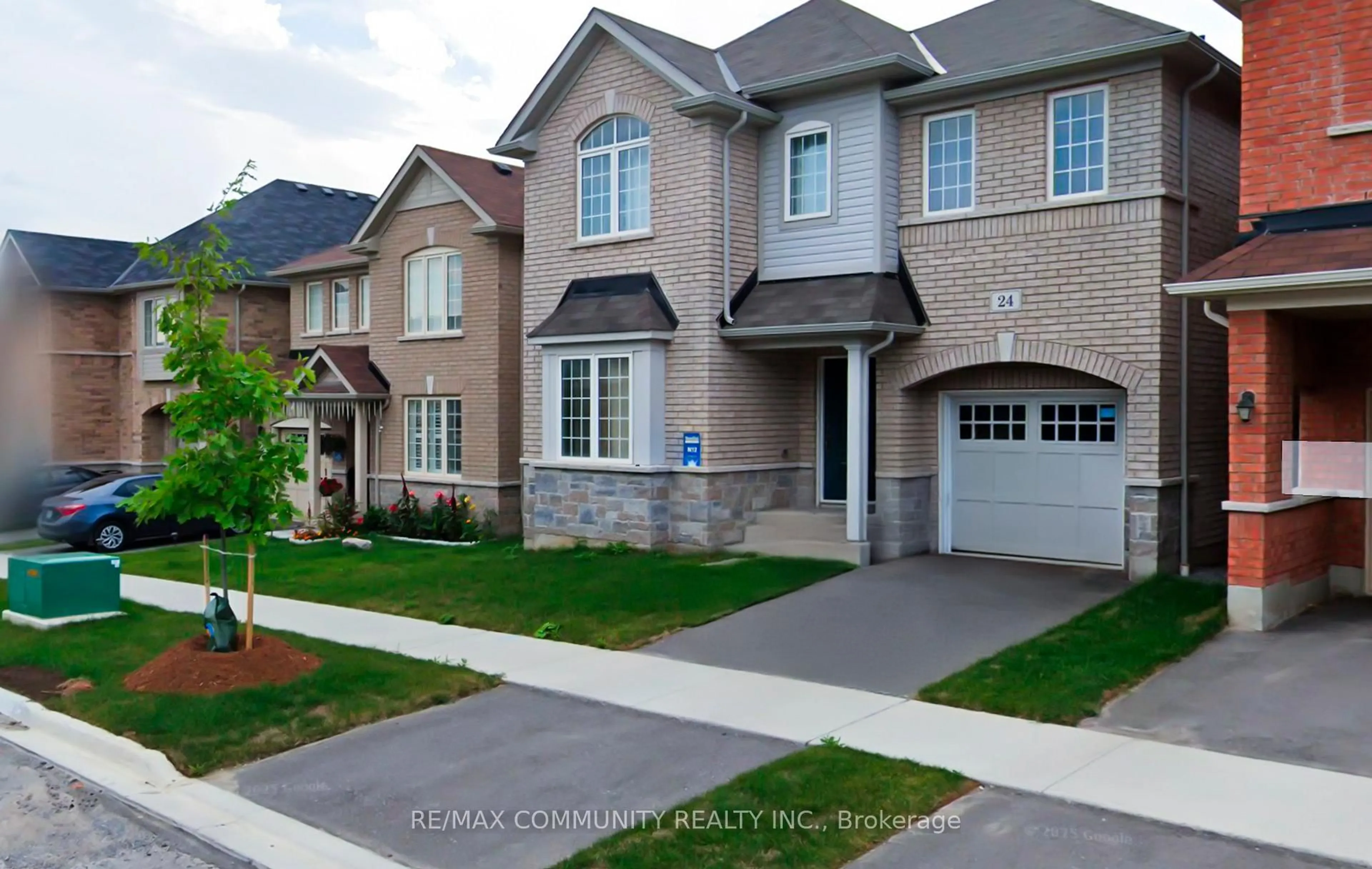 Home with brick exterior material, street for 24 Raithby Cres, Ajax Ontario L1Z 0S6