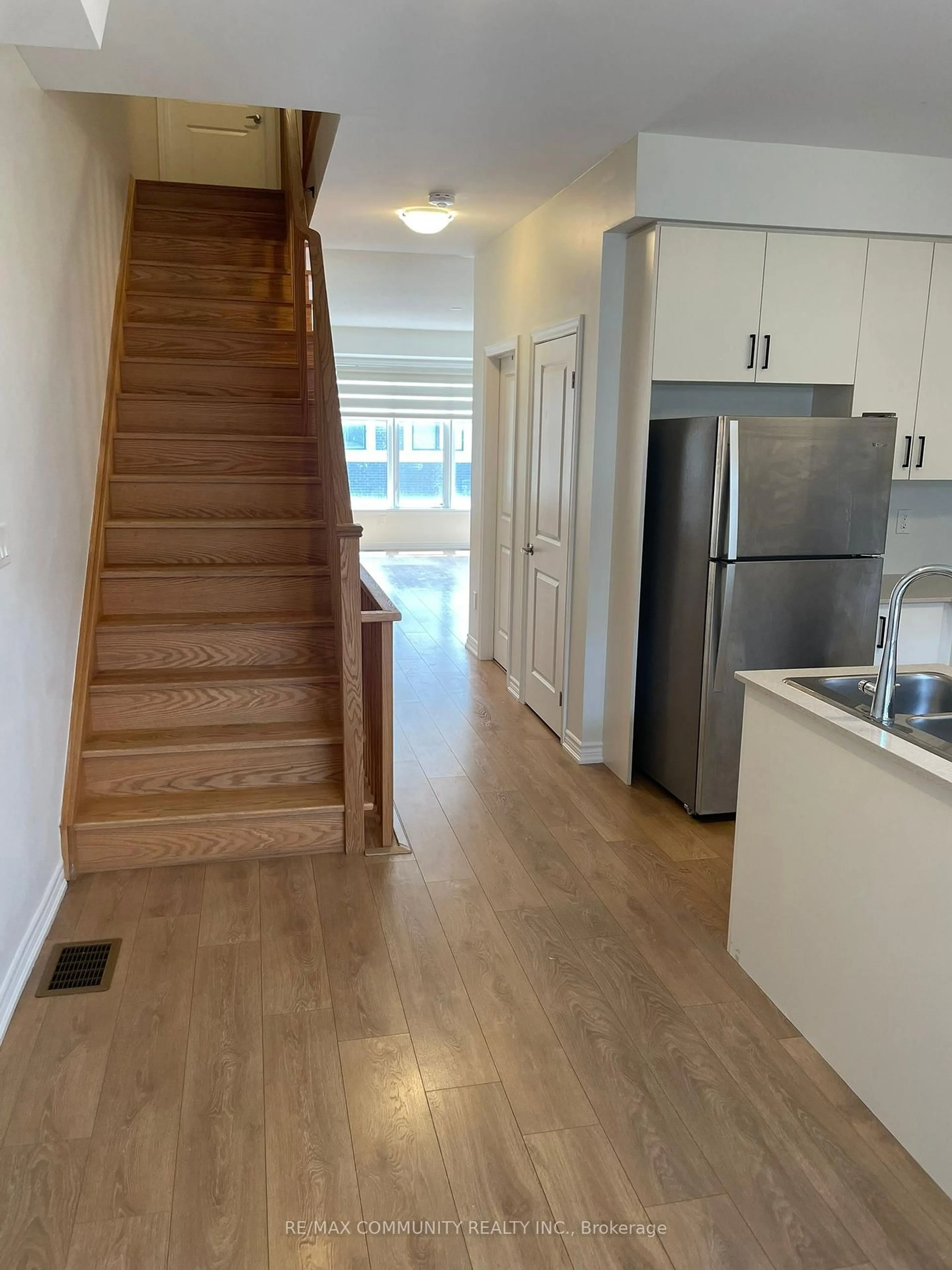 Open concept kitchen, wood/laminate floor for 766 Eddystone Path, Oshawa Ontario L1H 0A7